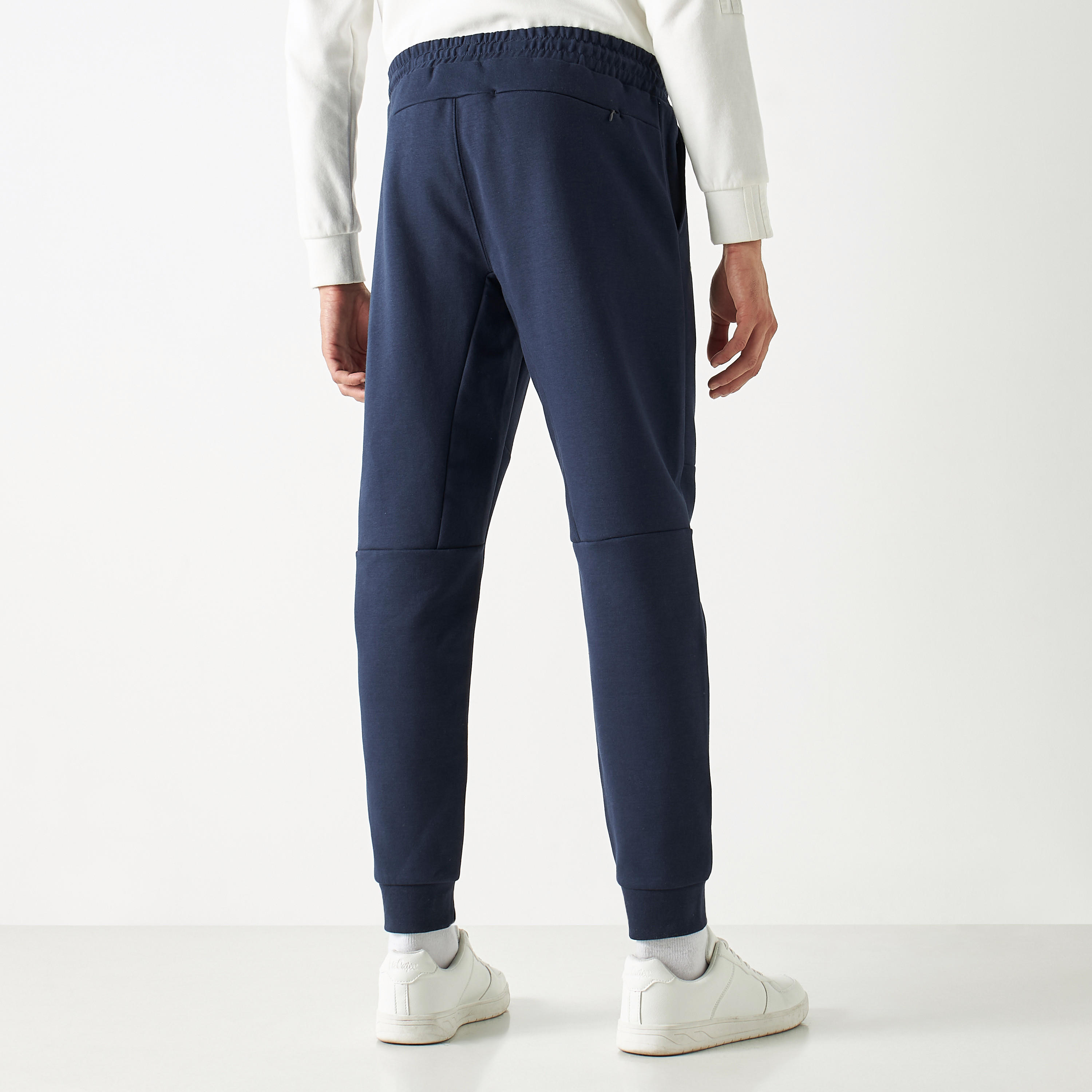 بنطلون رياضي بطبعات وبجيوب بسحّاب من كابا-men-clothing-sportswearandactivewear-bottoms-image-3