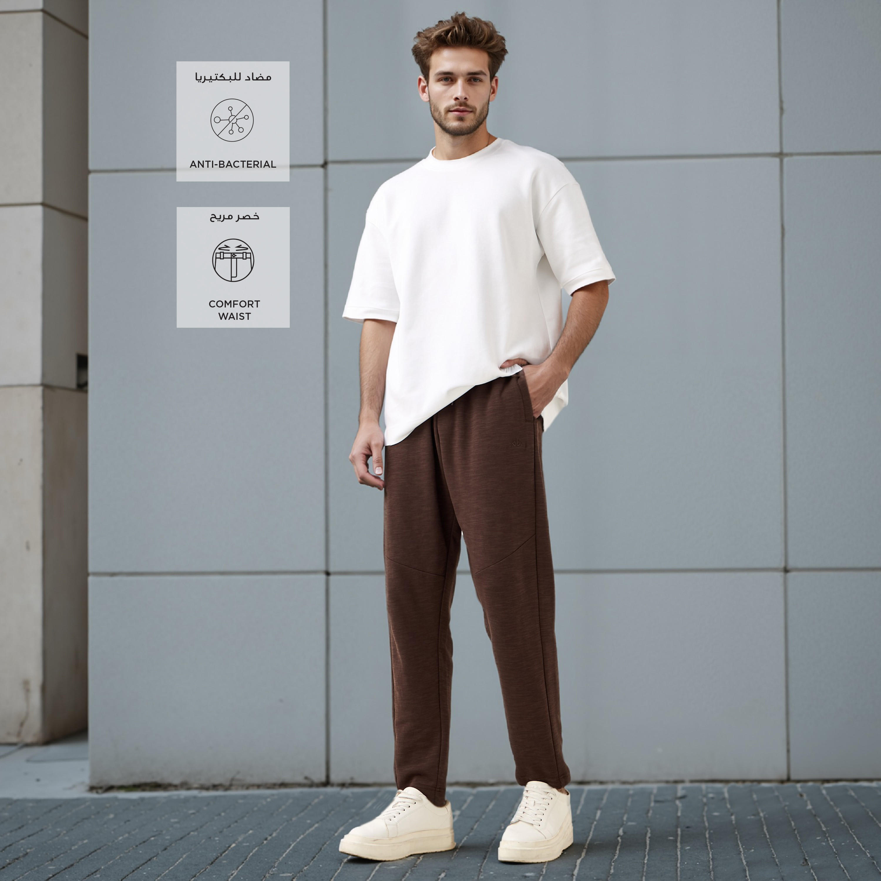 بنطلون رياضي بقصّة عادية ورباط وجيوب من كابا-men-clothing-sportswearandactivewear-tracksuits-image-2