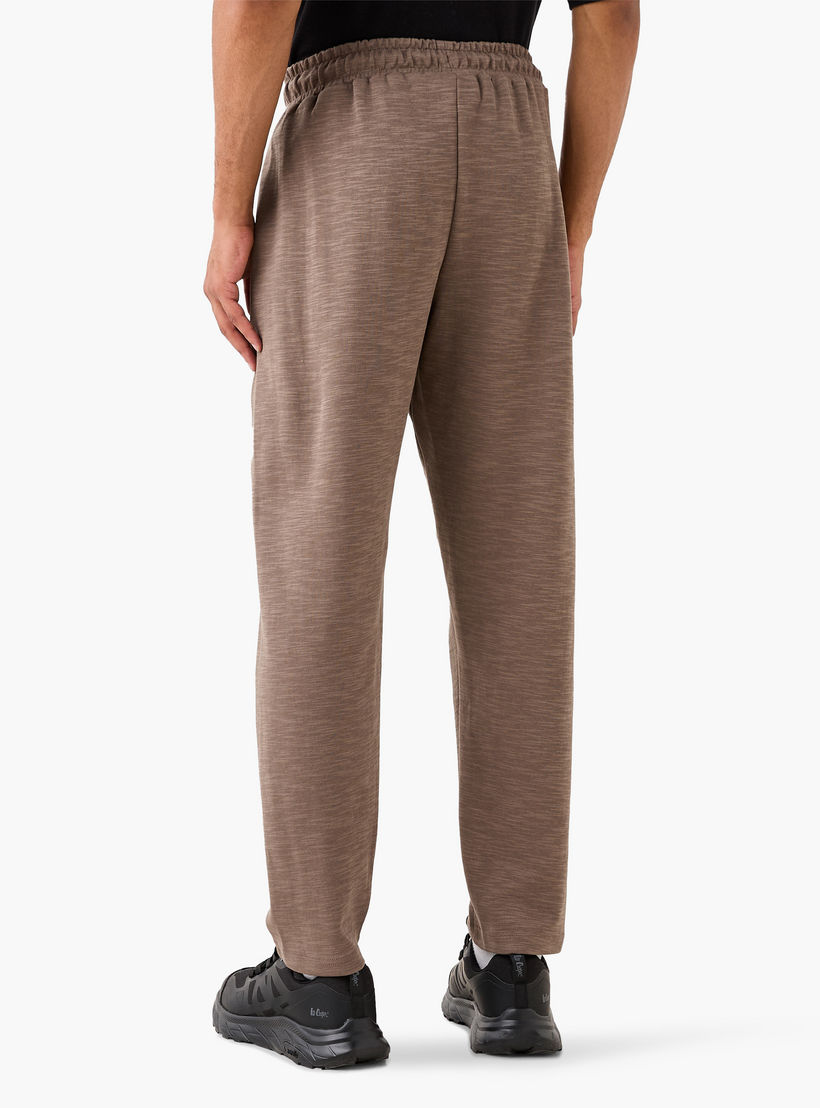 بنطلون رياضي بقصّة عادية ورباط وجيوب من كابا-men-clothing-sportswearandactivewear-tracksuits-image-3