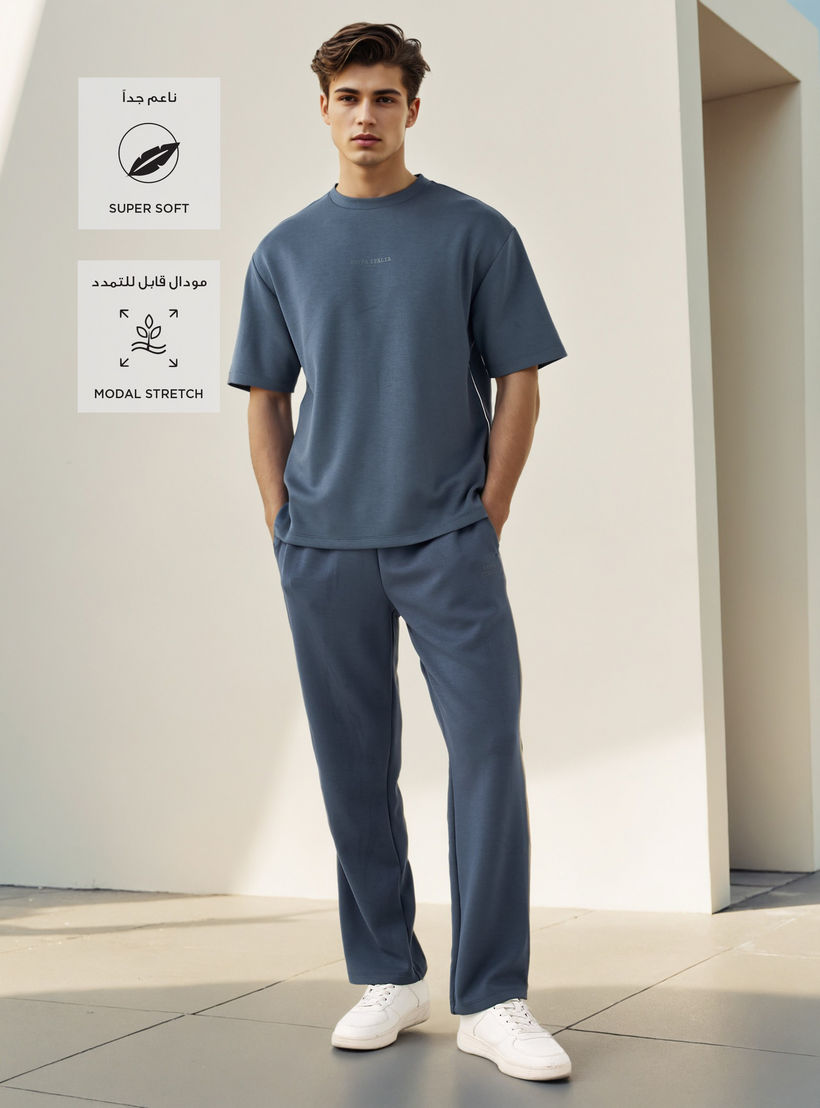 بنطلون رياضي برباط إغلاق وطبعات من كابا-men-clothing-sportswearandactivewear-bottoms-joggers-image-4