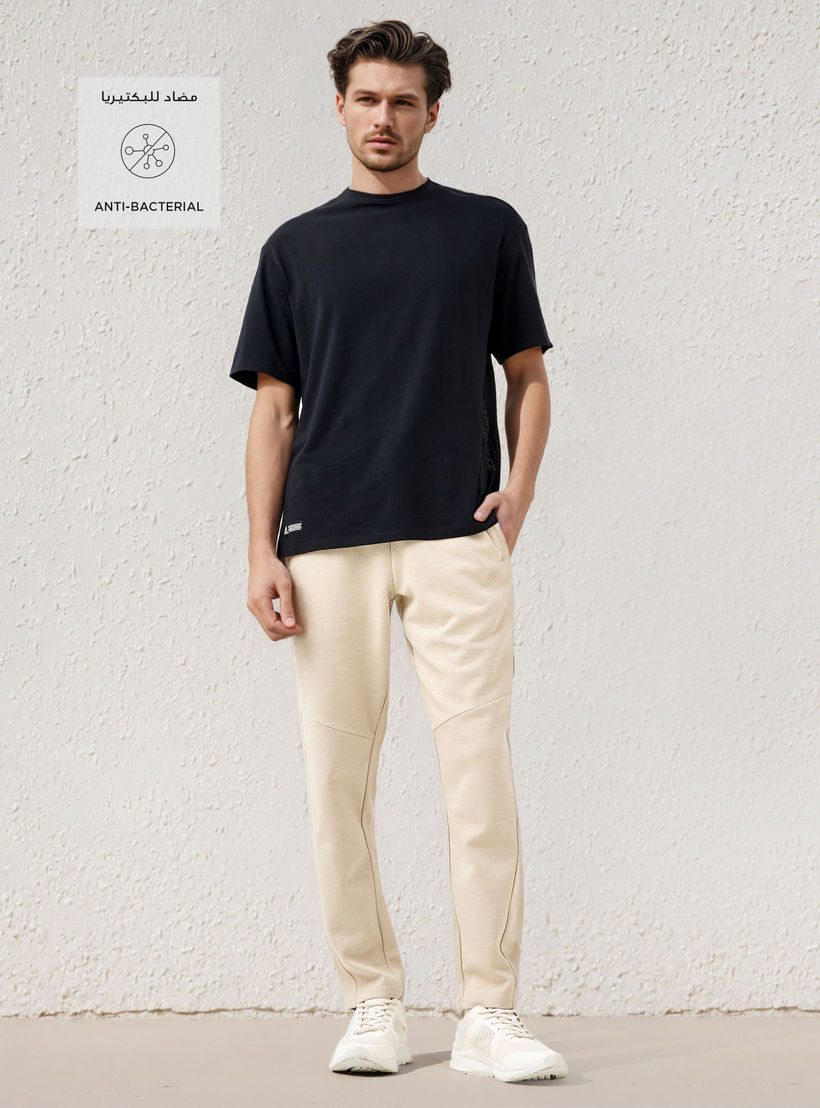 بنطلون رياضي بقصة عادية وجيوب من كابا-men-clothing-sportswearandactivewear-tracksuits-image-2