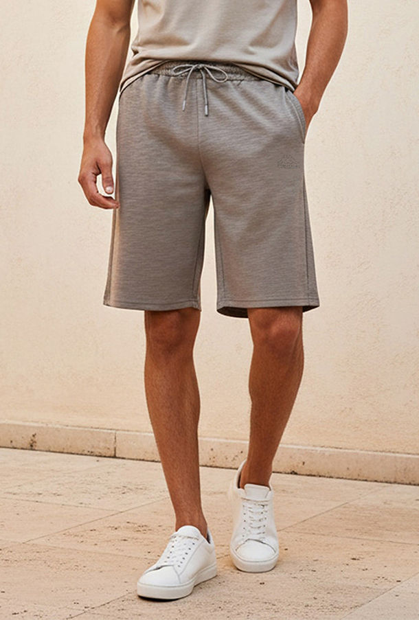 شورت رجالي مريح بمرونة فائقة وملمس بارز من كابا-sports-men-clothing-bottoms-image-1