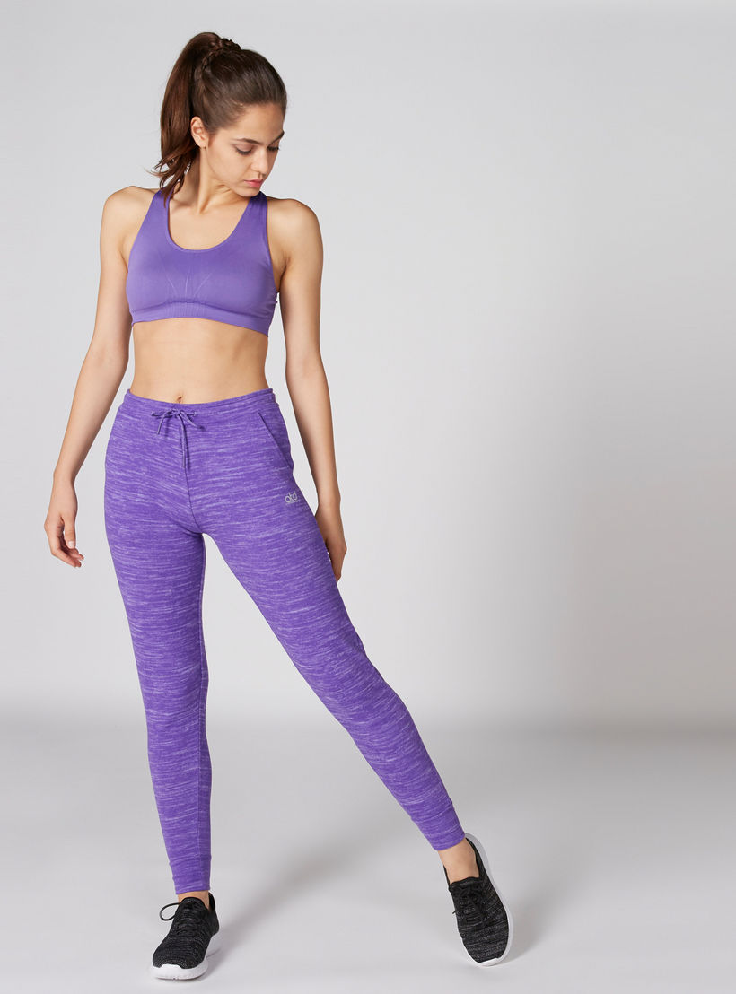 بنطال رياضي بنقوش وخصر مطاطي وجيب-women-clothing-sportswearandactivewear-bottoms-image-1