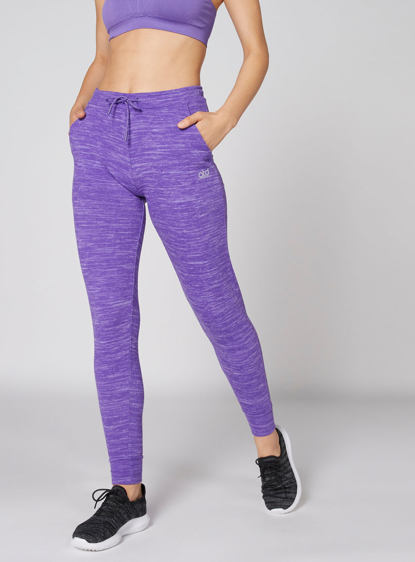 بنطال رياضي بنقوش وخصر مطاطي وجيب-women-clothing-sportswearandactivewear-bottoms-image-3