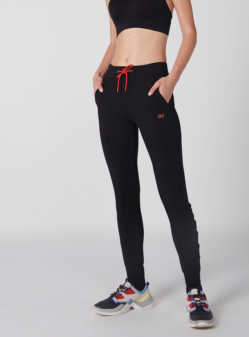 بنطال رياضي طويل بخصر مطّاطي وجيوب-women-clothing-sportswearandactivewear-bottoms-image-2