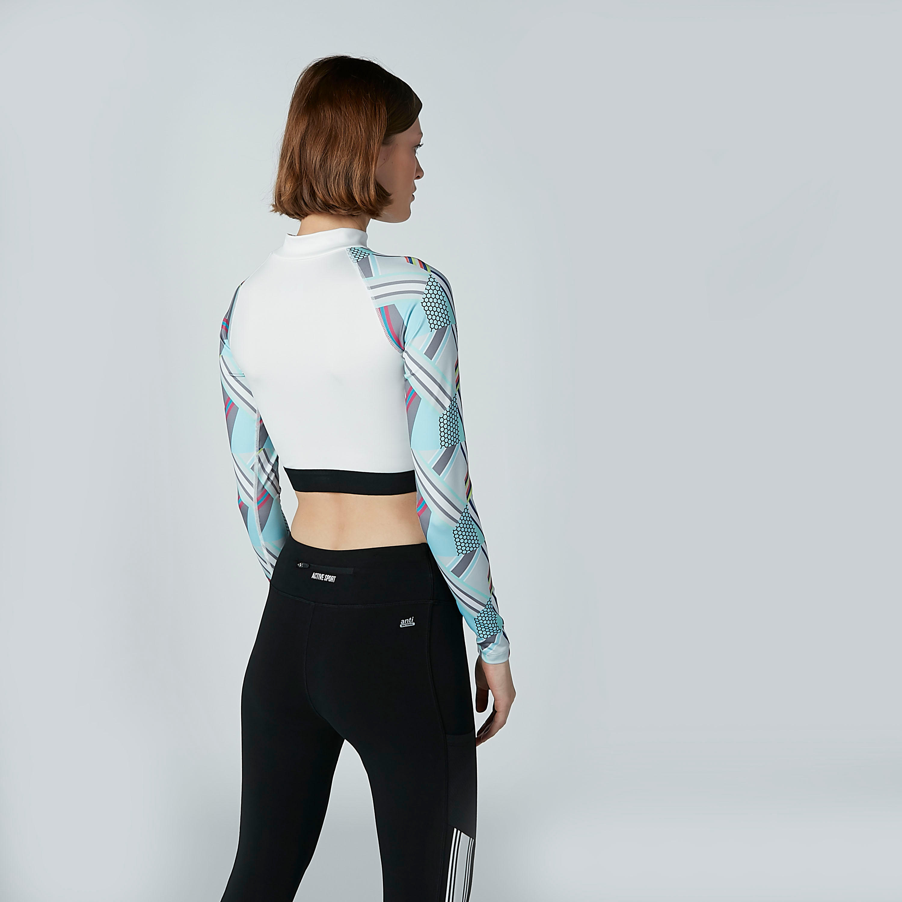 بلوزة بياقة عالية وأكمام مغايرة وطبعات-women-clothing-sportswearandactivewear-tshirtsandvests-image-4