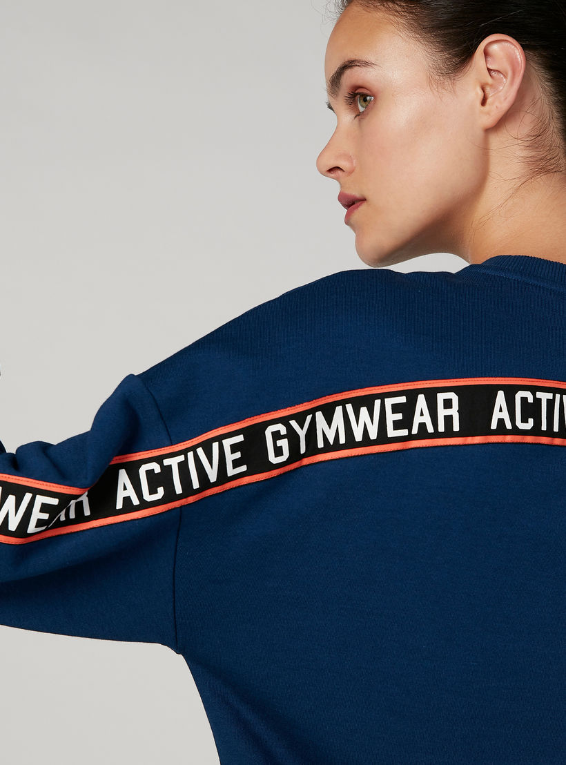 سويت شيرت بياقة مستديرة وأكمام طويلة وطبعات-women-clothing-sportswearandactivewear-hoodiesandsweatshirts-image-3