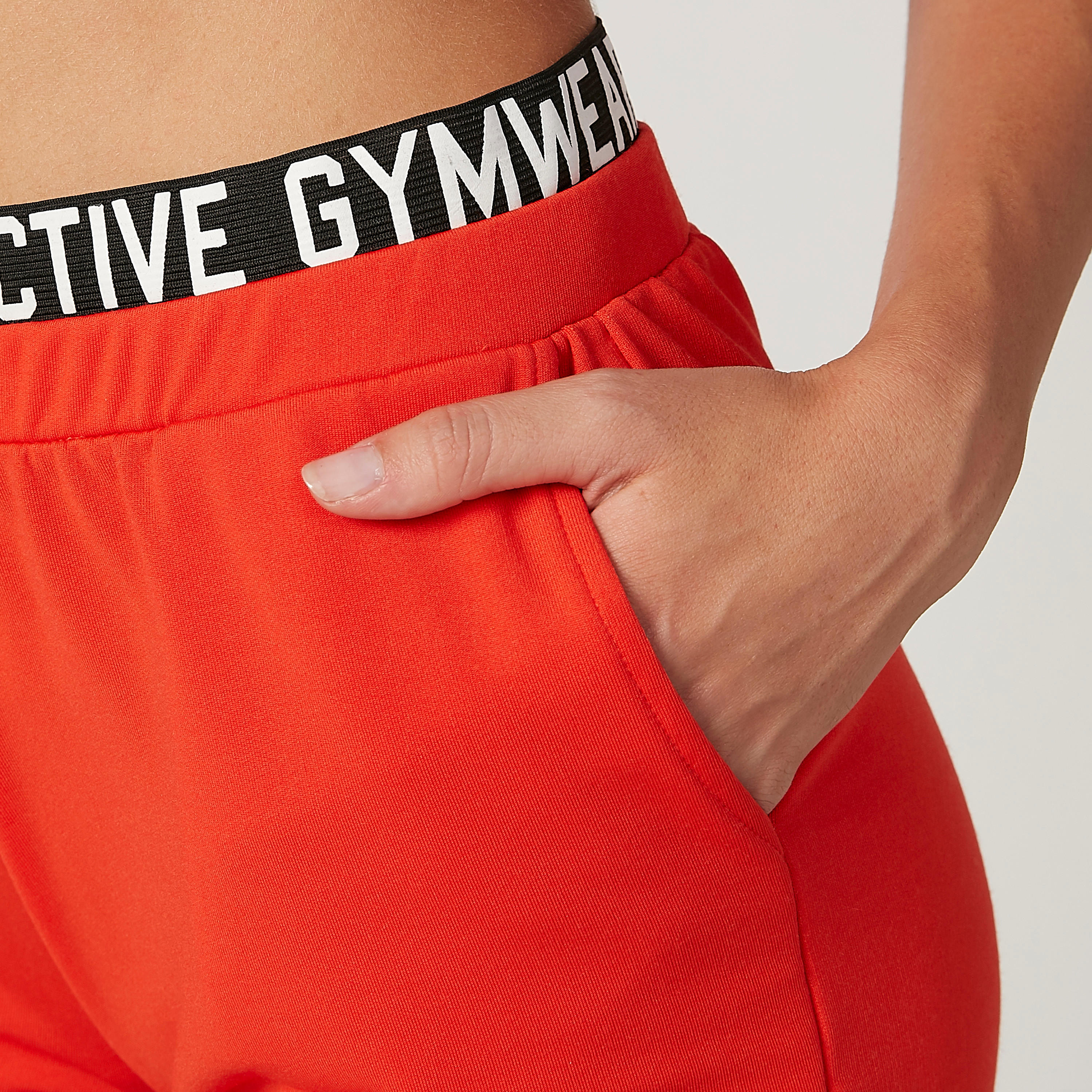 شورت سادة بخصر مطّاطي وجيوب وطبعات-women-clothing-sportswearandactivewear-bottoms-image-3