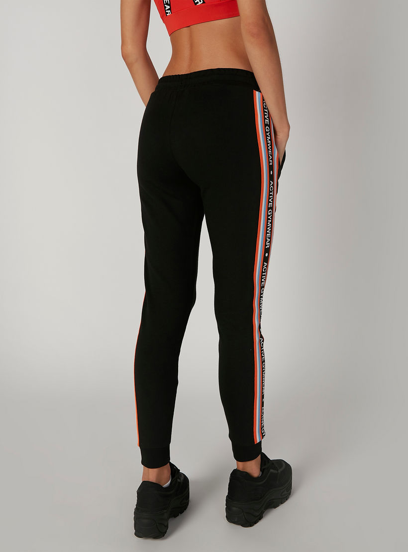 بنطلون رياضي بخصر مطّاطي وشريطة وطبعات-women-clothing-sportswearandactivewear-bottoms-image-2