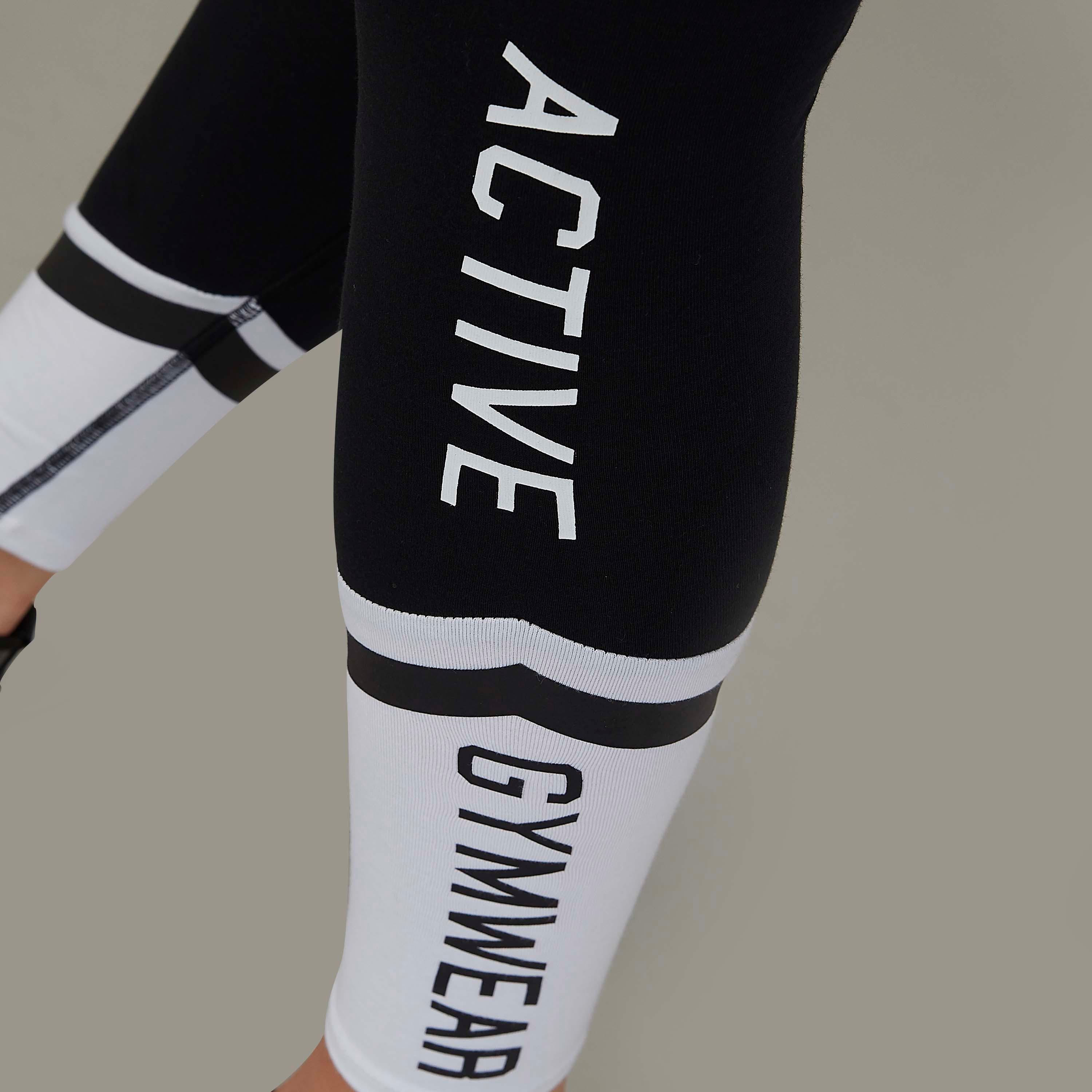 بنطلون ليقنز بخصر مطّاطي وطبعات-women-clothing-bottoms-leggings-image-3