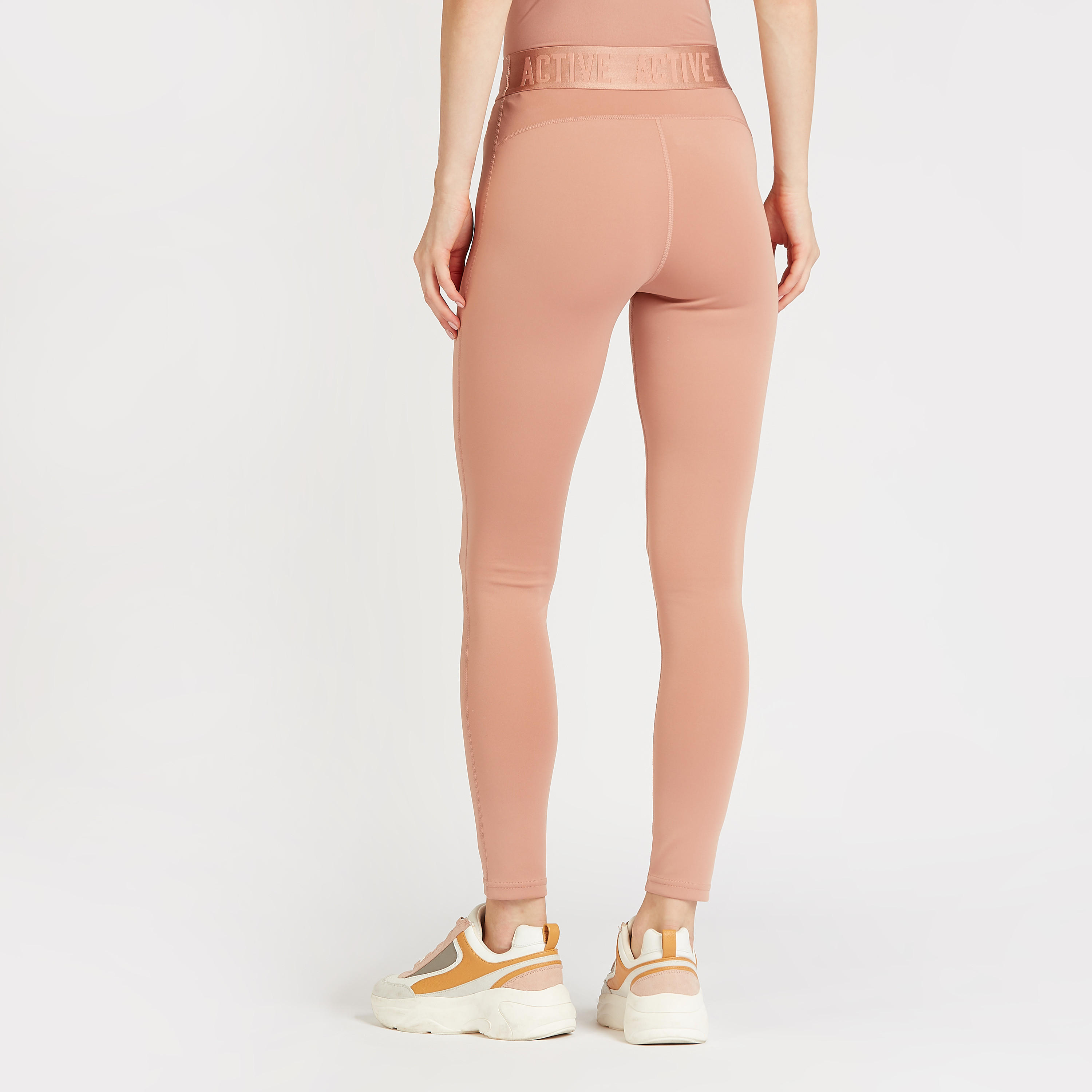 بنطلون ليقنز سادة بخصر مطّاطي بطبعات-women-clothing-sportswearandactivewear-bottoms-image-1