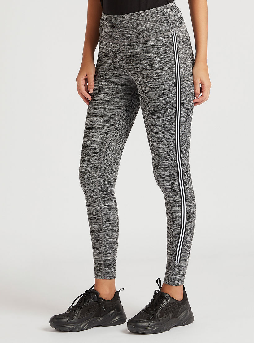 بنطلون ليقنز بطبعات وتفاصيل شريطة وجيوب بسحّاب-women-clothing-bottoms-leggings-image-1