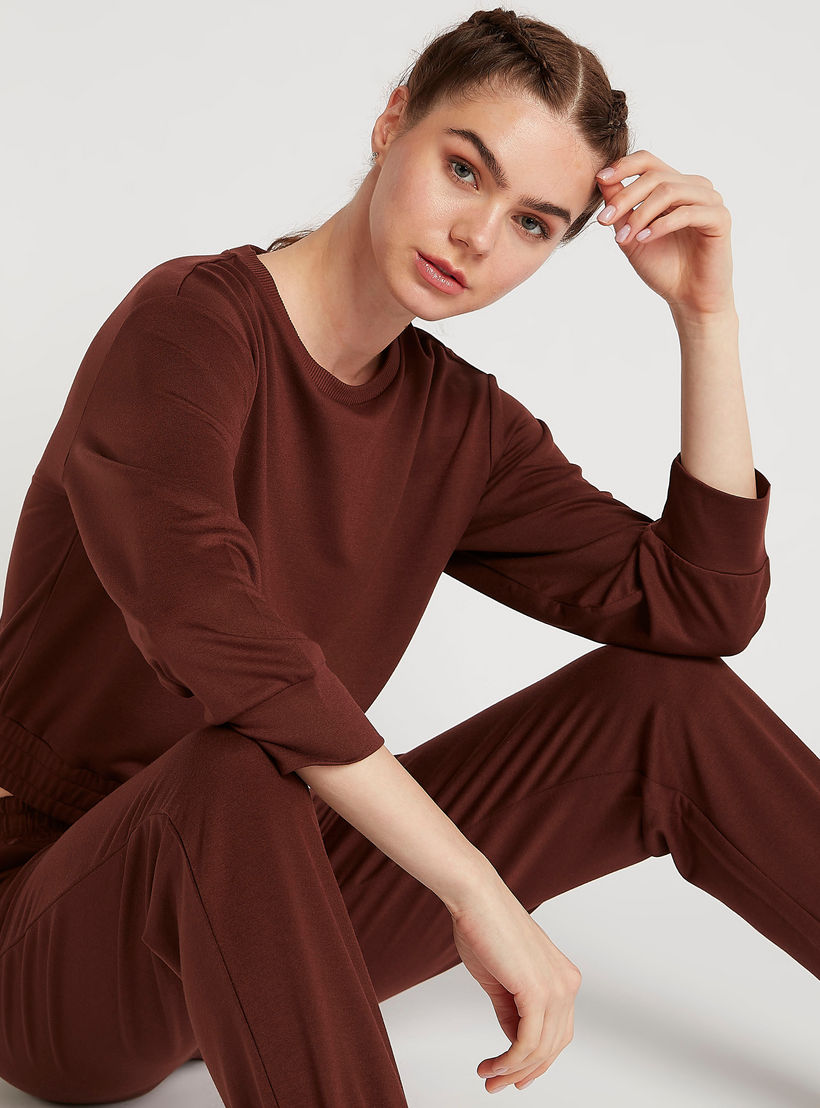 سويت شيرت سادة بأكمام طويلة وأطراف مطّاطيّة-women-clothing-sportswearandactivewear-hoodiesandsweatshirts-image-5