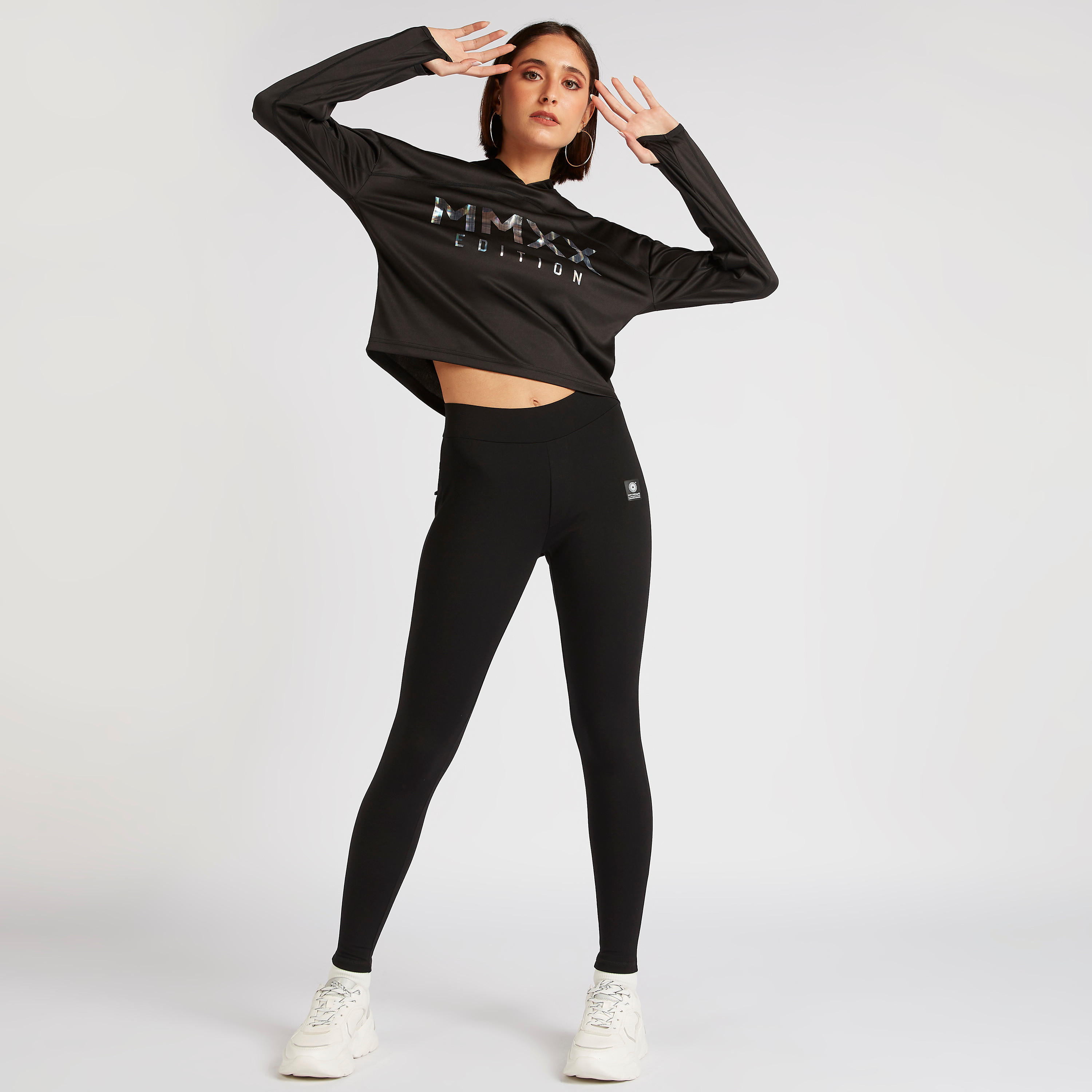 بنطلون ليقنز سادة بخصر مطّاطي وجيوب بسحّاب-women-clothing-bottoms-leggings-image-4