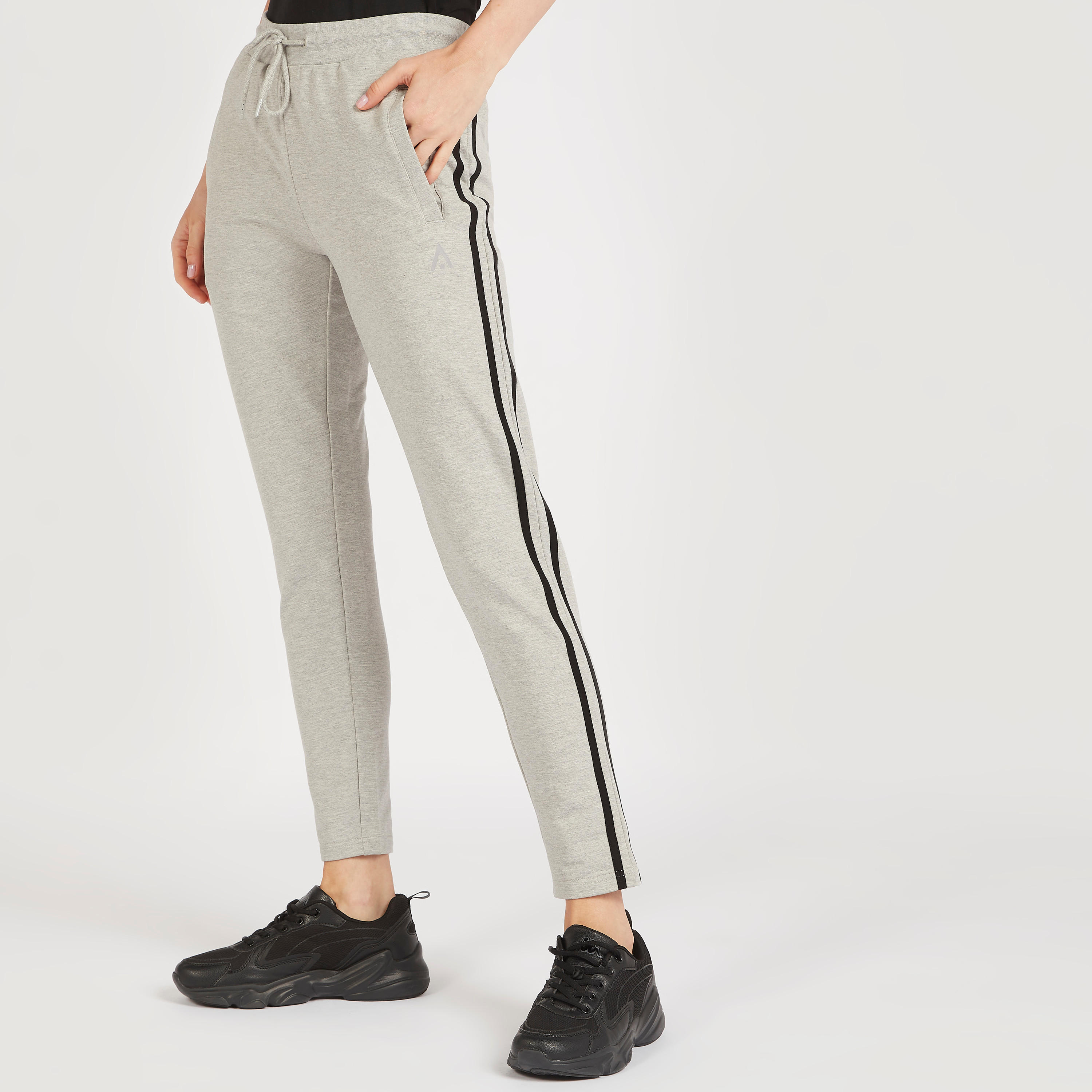 بنطلون رياضي سادة بجيوب وتفاصيل شريطة-women-clothing-sportswearandactivewear-bottoms-image-1