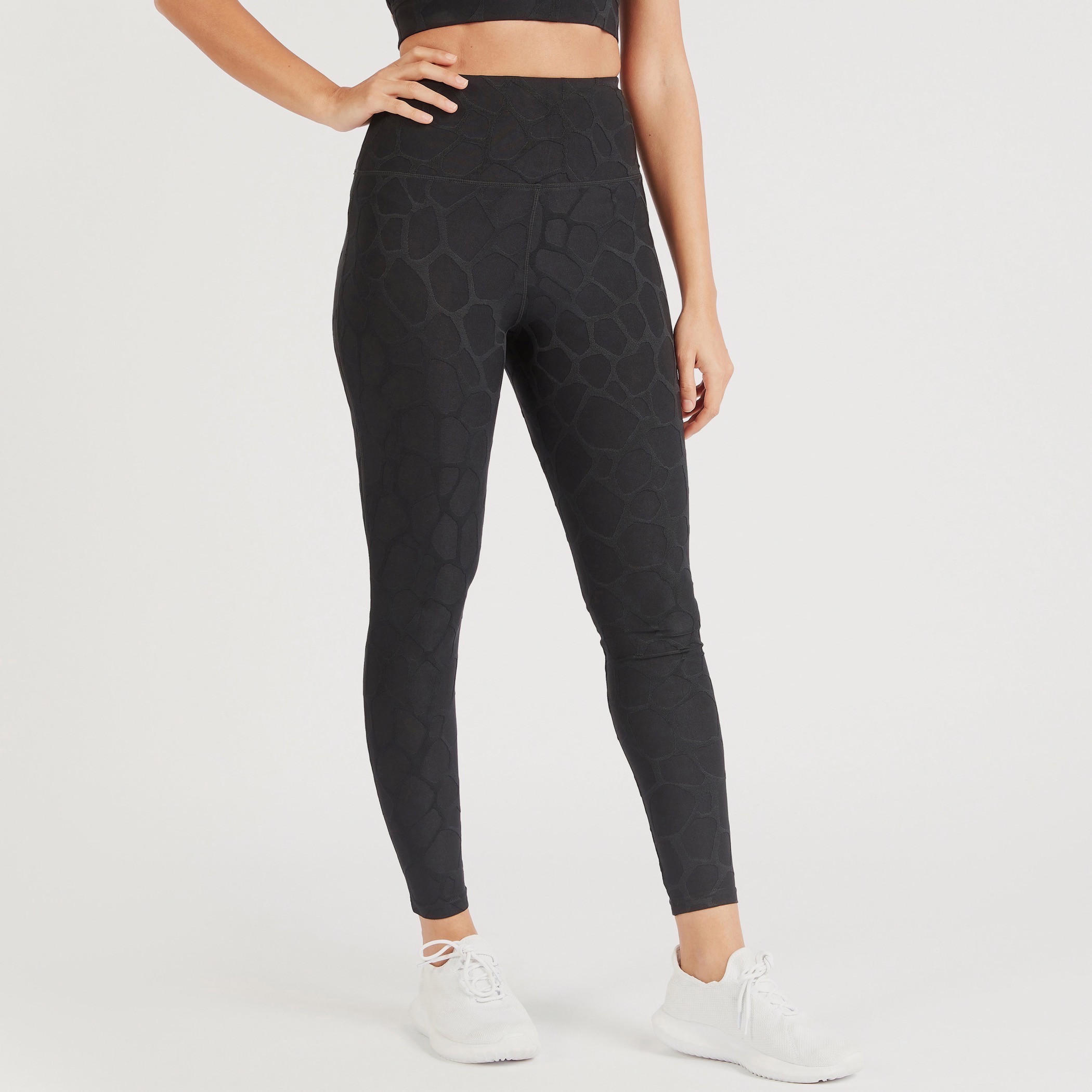 بنطلون ليقنز بارز الملمس بخصر مطّاطي-women-clothing-bottoms-leggings-image-1