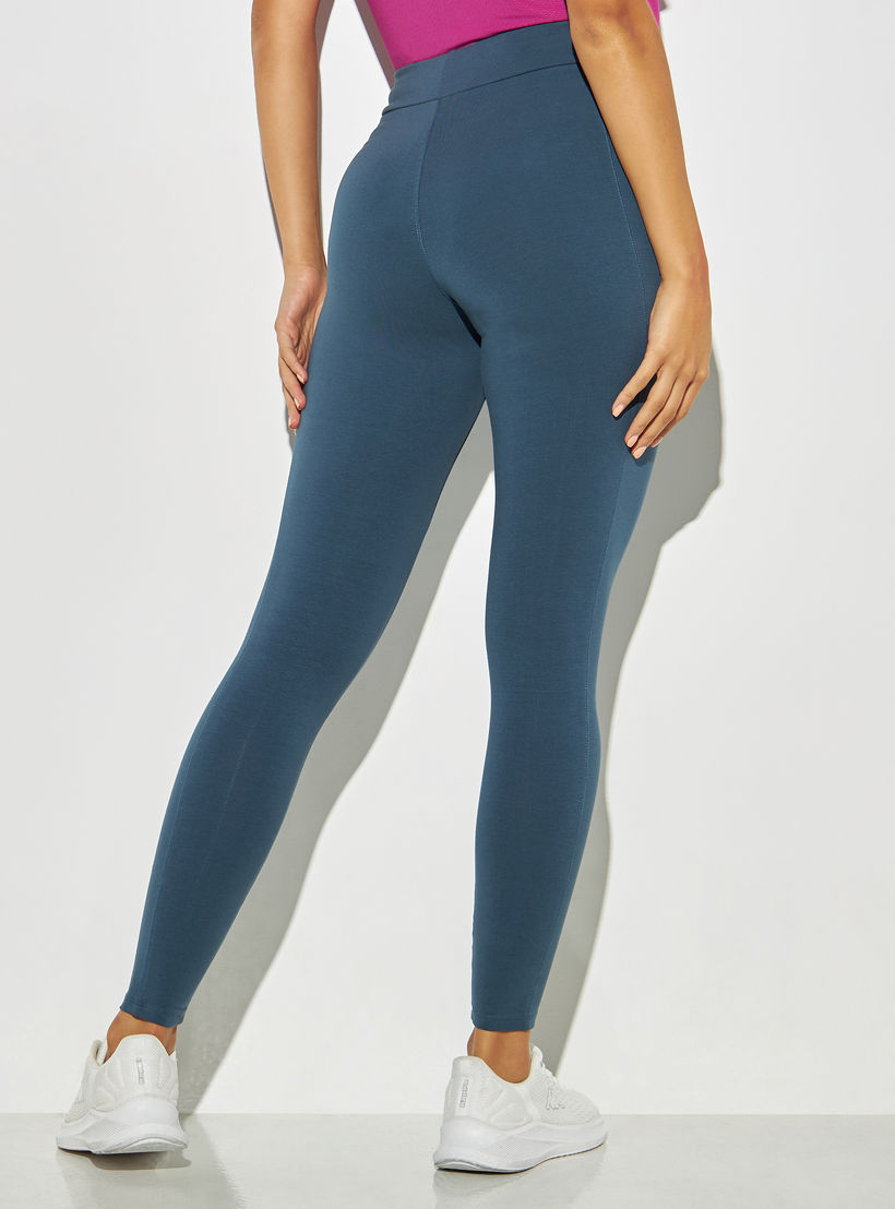بنطلون ليقنز سادة بخصر مطّاطي-women-clothing-bottoms-leggings-image-2