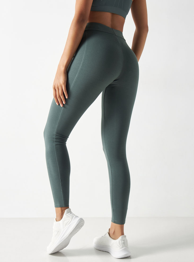بنطلون ليقنز سادة بحزام خصر مطّاطي-women-clothing-bottoms-leggings-image-2