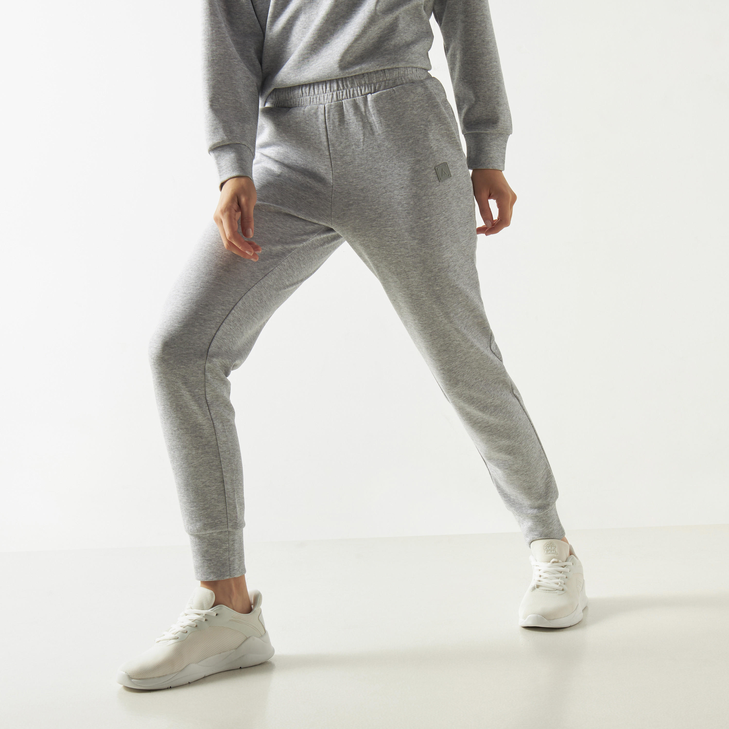 بنطلون رياضي سادة بجيوب وخصر مطاطي-women-clothing-bottoms-joggers-image-1