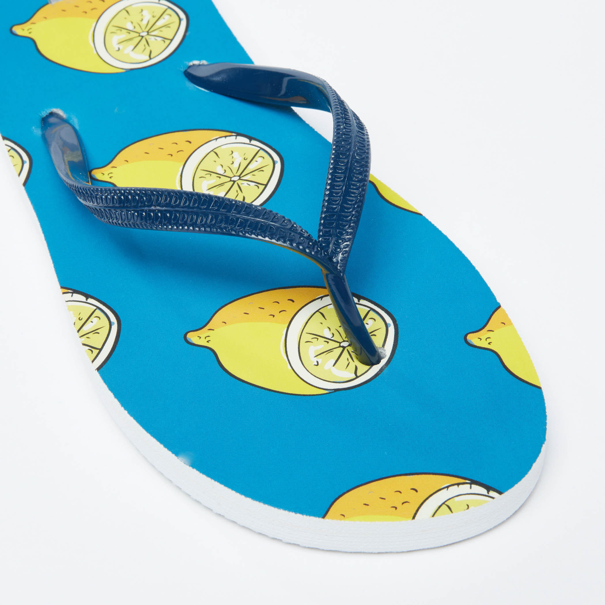 شبشب فليب فلوب بأحزمة بارزة الملمس وطبعات ليمون-women-shoes-flipflopsandslides-image-3