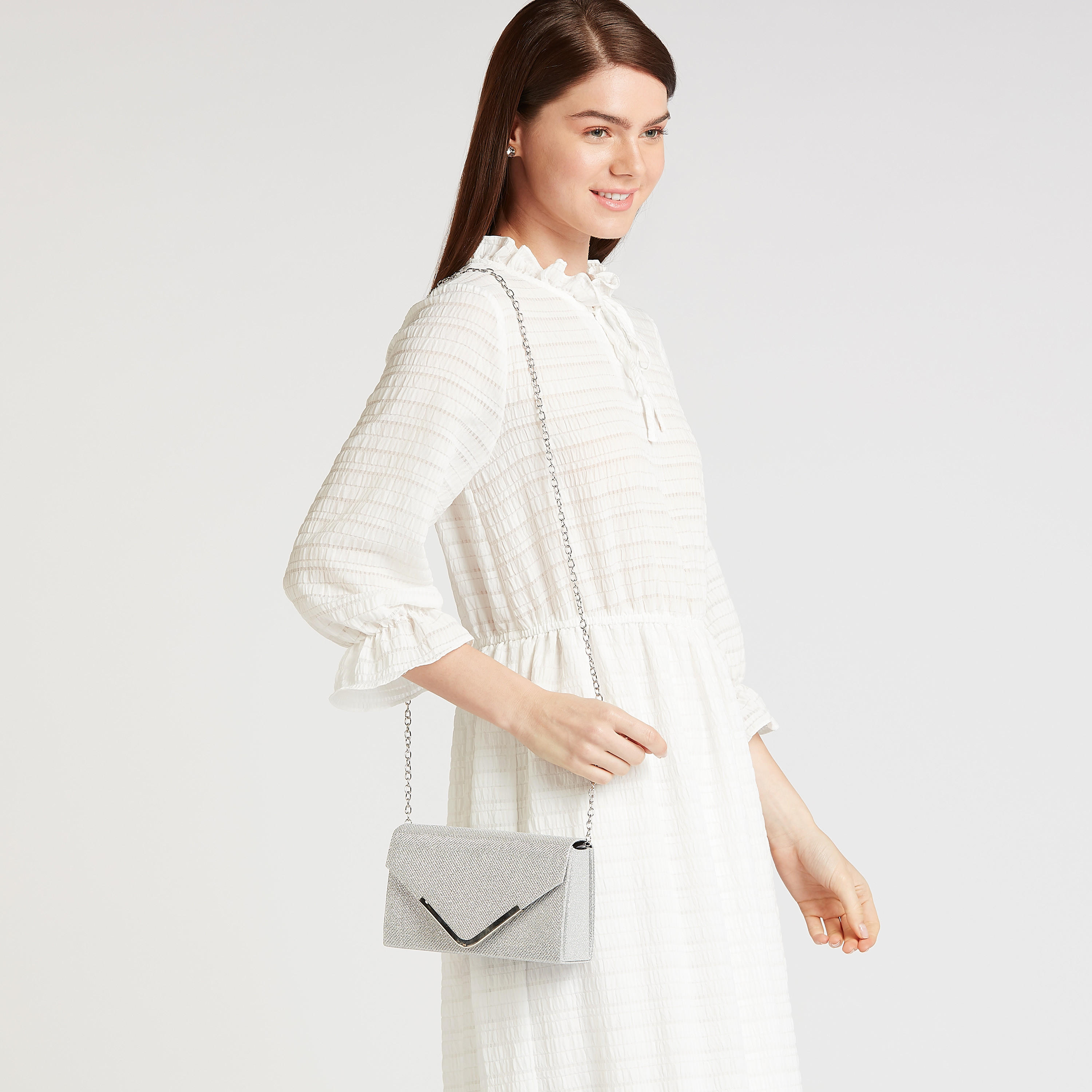 شنطة كلاتش بارزة الملمس بزر إغلاق مغناطيسي وسلسلة ميتاليك-women-bagsandwallets-handbags-image-2