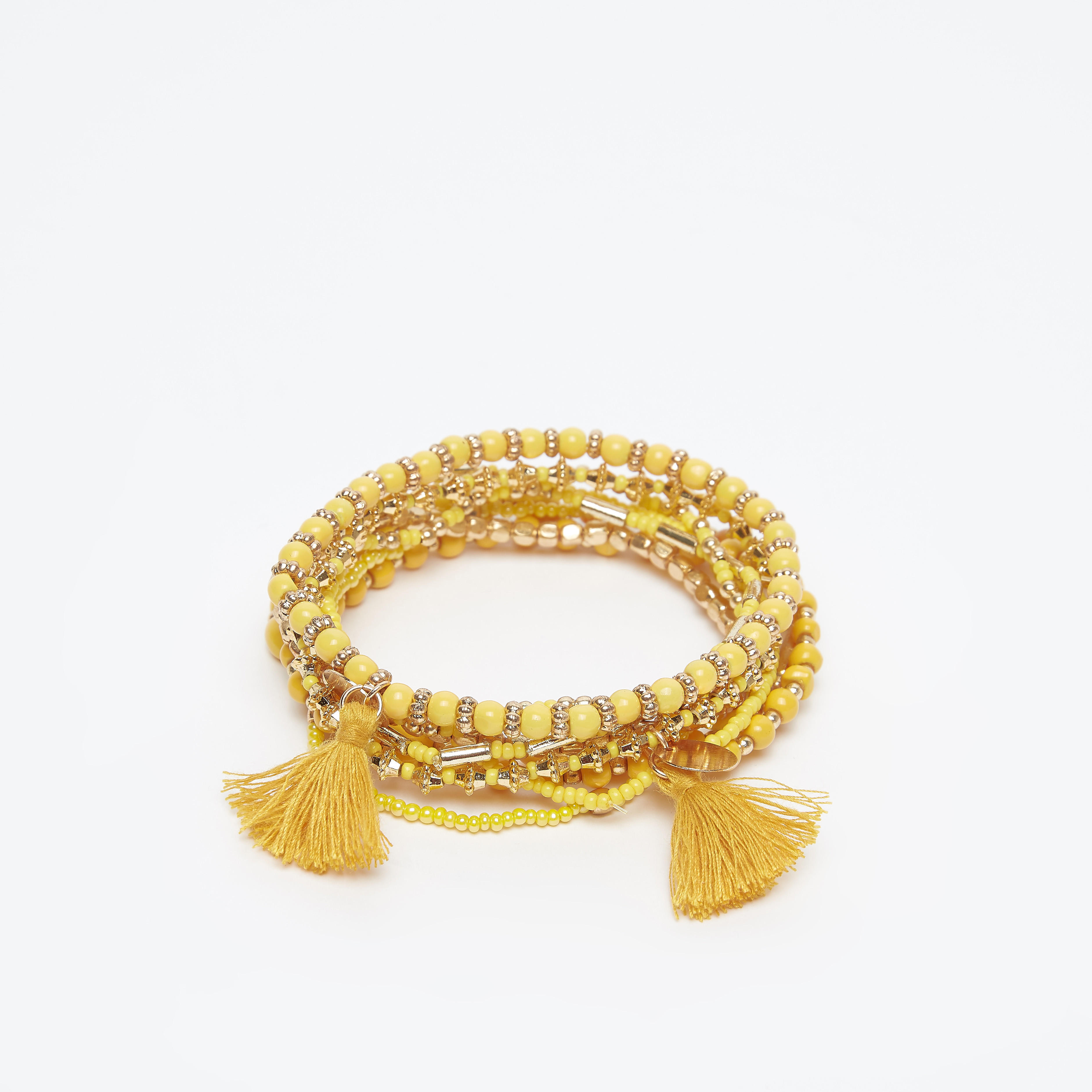 أساور مزينة بالخرز - طقم من 8 قطع-women-watchesandjewellery-jewellery-banglesandbracelets-image-1