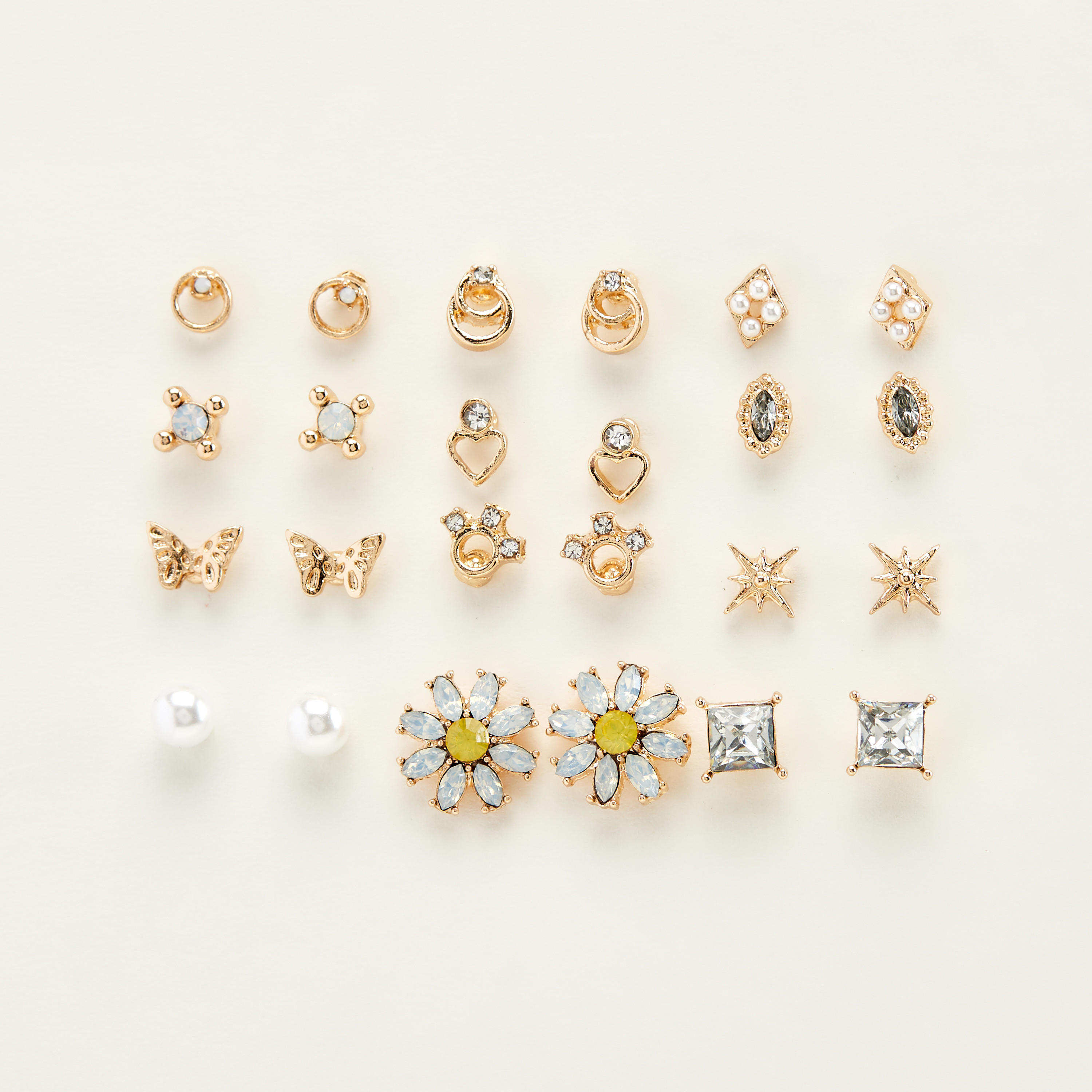 حلقان متنوعة مرصّعة بمكبس إغلاق خلفي - طقم من 12-women-watchesandjewellery-jewellery-earrings-image-1