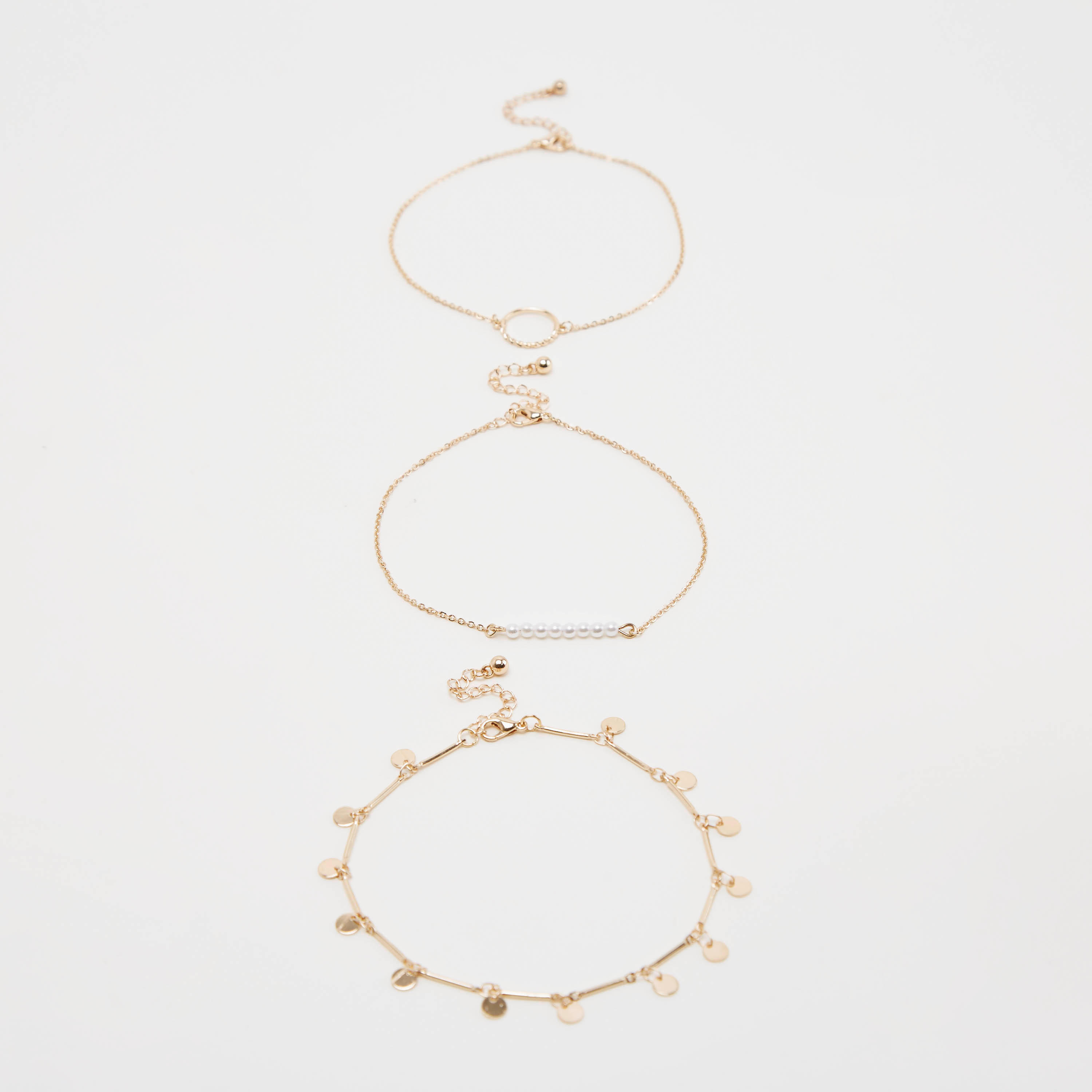 أساور مزيّنة بمشبك إغلاق - طقم من 3 قطع-women-watchesandjewellery-jewellery-banglesandbracelets-image-1