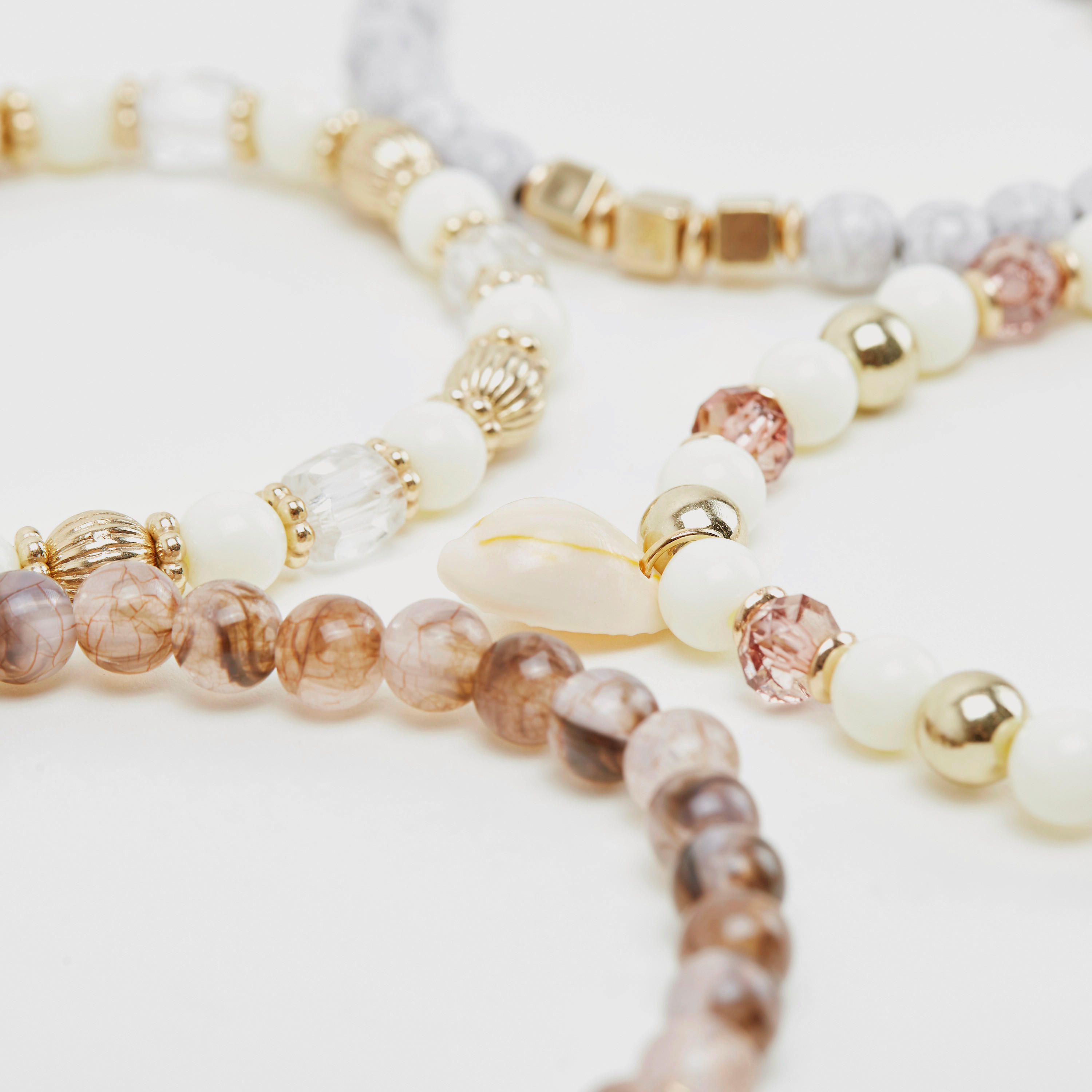 أساور مزيّنة- طقم من 4 قطع-women-watchesandjewellery-jewellery-banglesandbracelets-image-3