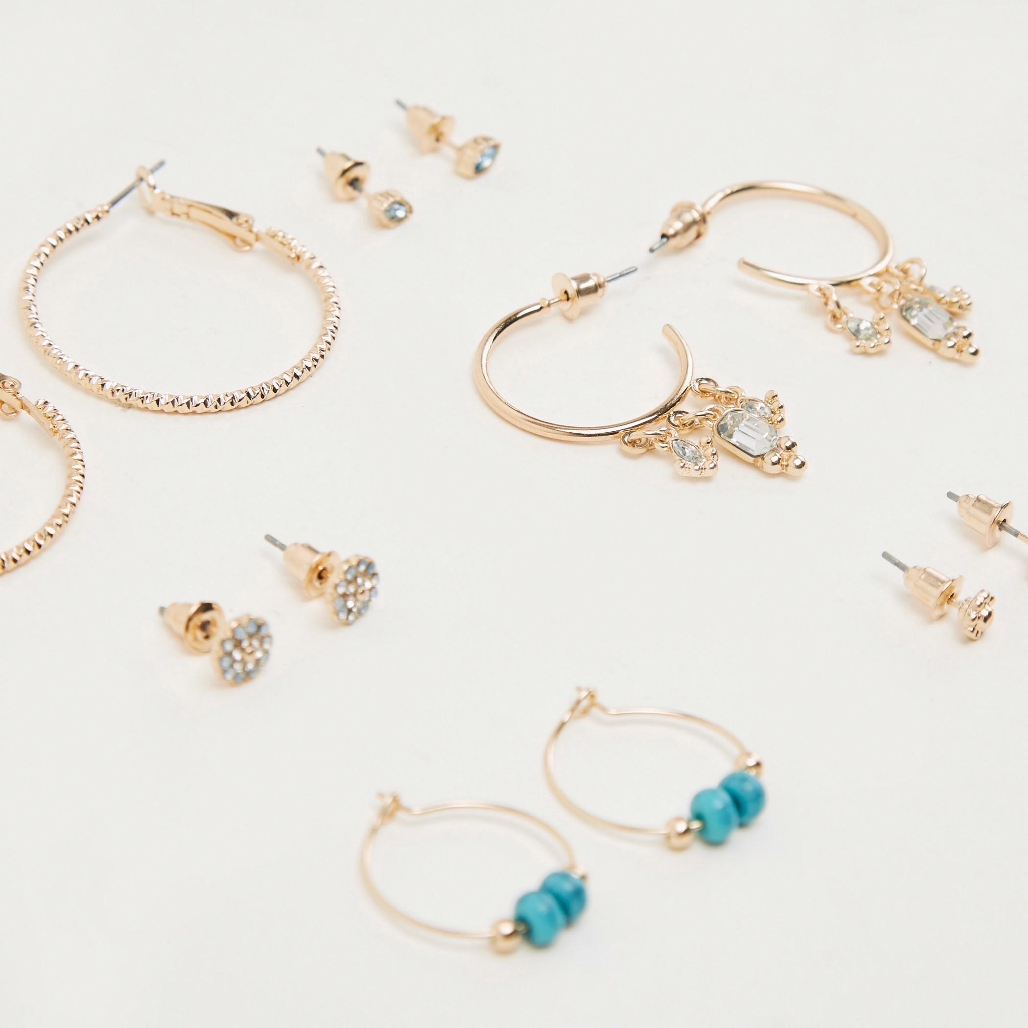 حلقان بتزيينات متنوعة - طقم من 6-women-watchesandjewellery-jewellery-earrings-image-1