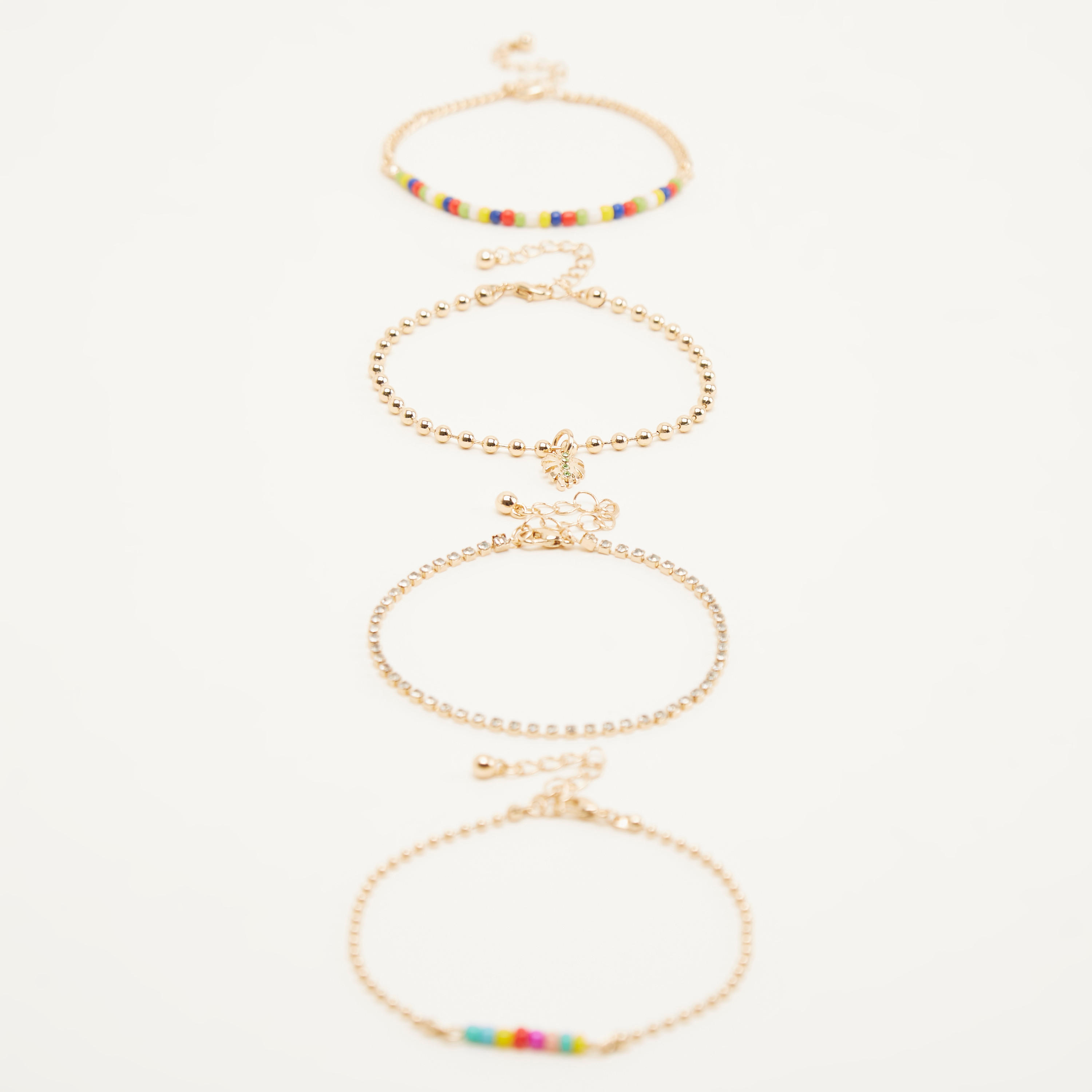 أساور مزيّنة- طقم من 4 قطع-women-watchesandjewellery-jewellery-banglesandbracelets-image-1