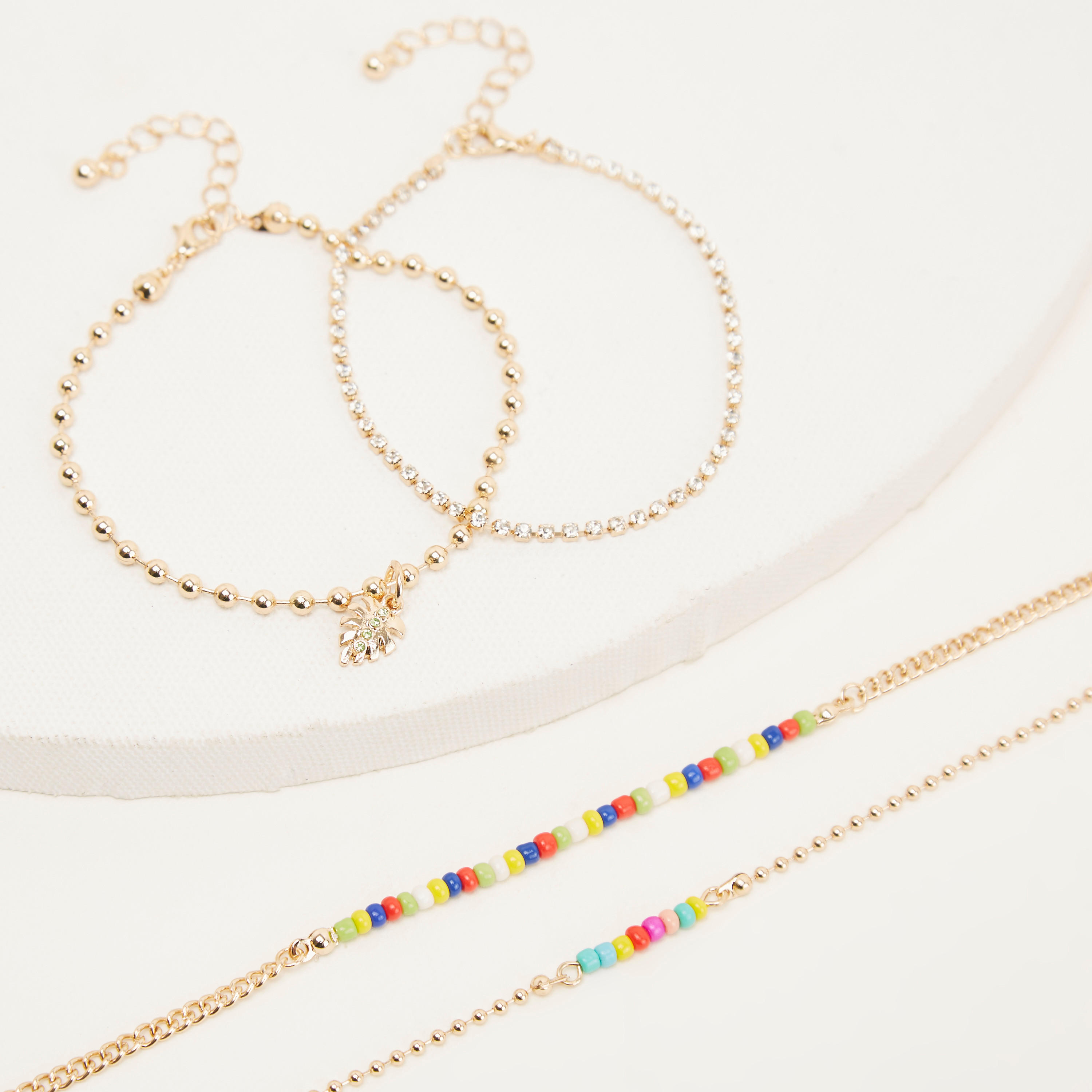 أساور مزيّنة- طقم من 4 قطع-women-watchesandjewellery-jewellery-banglesandbracelets-image-5