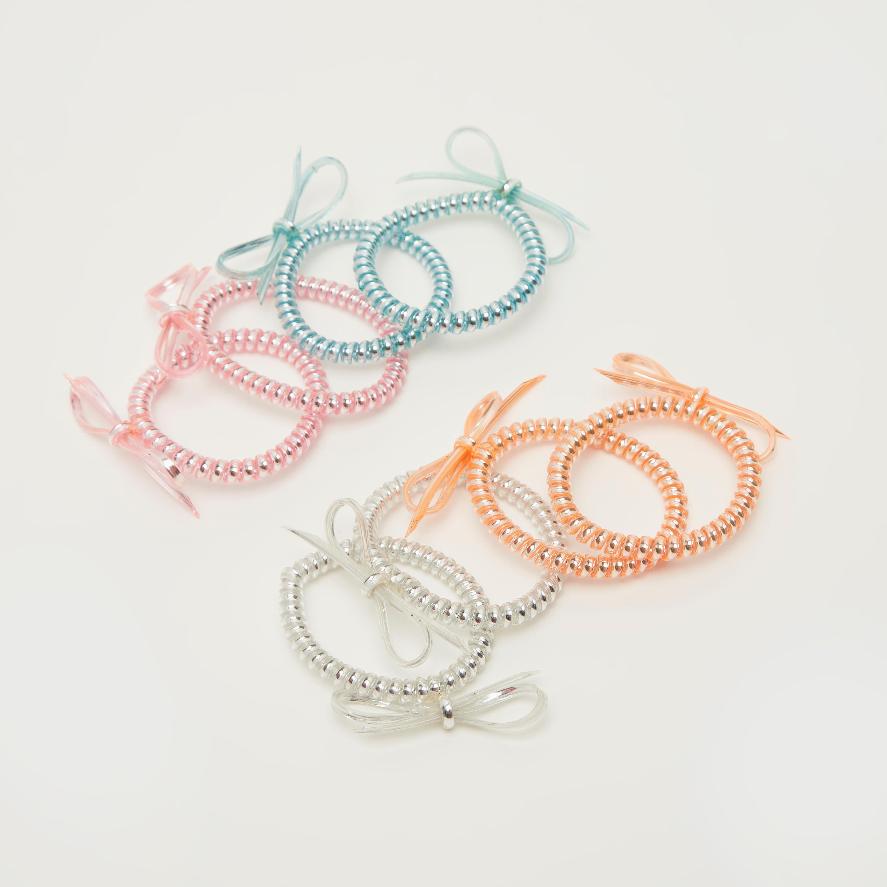 ربطات شعر لولبية منقوشة بتفاصيل فيونكة- مجموعة من 8 قطع-women-hairaccessories-image-3