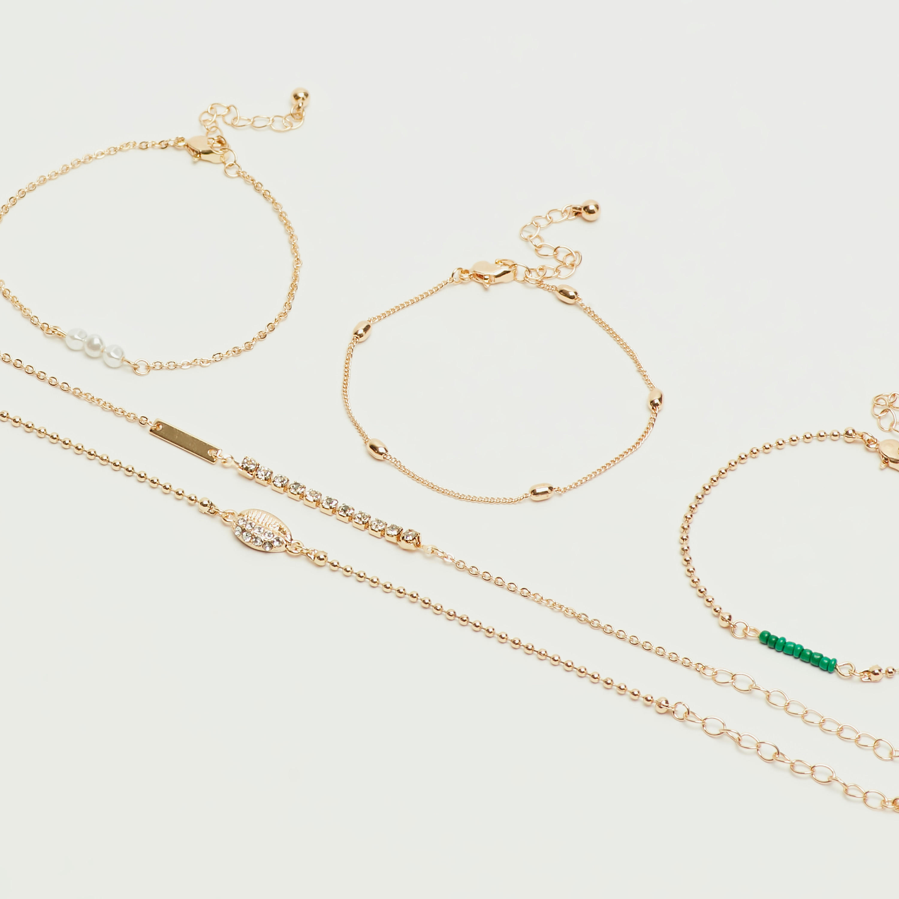 أساور متنوعة مزيّنة - طقم من 5 قطع-women-watchesandjewellery-jewellery-banglesandbracelets-image-3