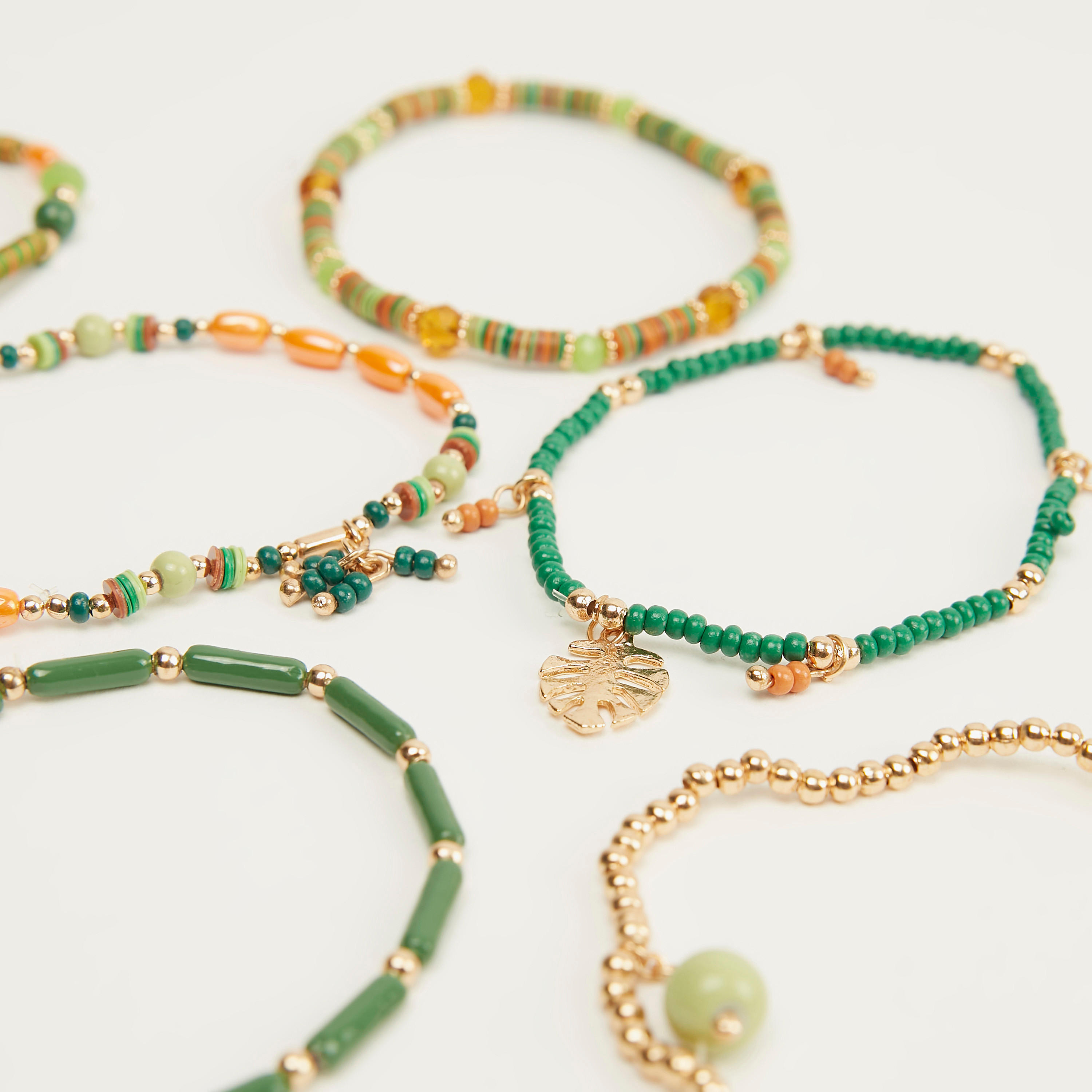 أساور متنوعة مزينة - طقم من 8 قطع-women-watchesandjewellery-jewellery-banglesandbracelets-image-3