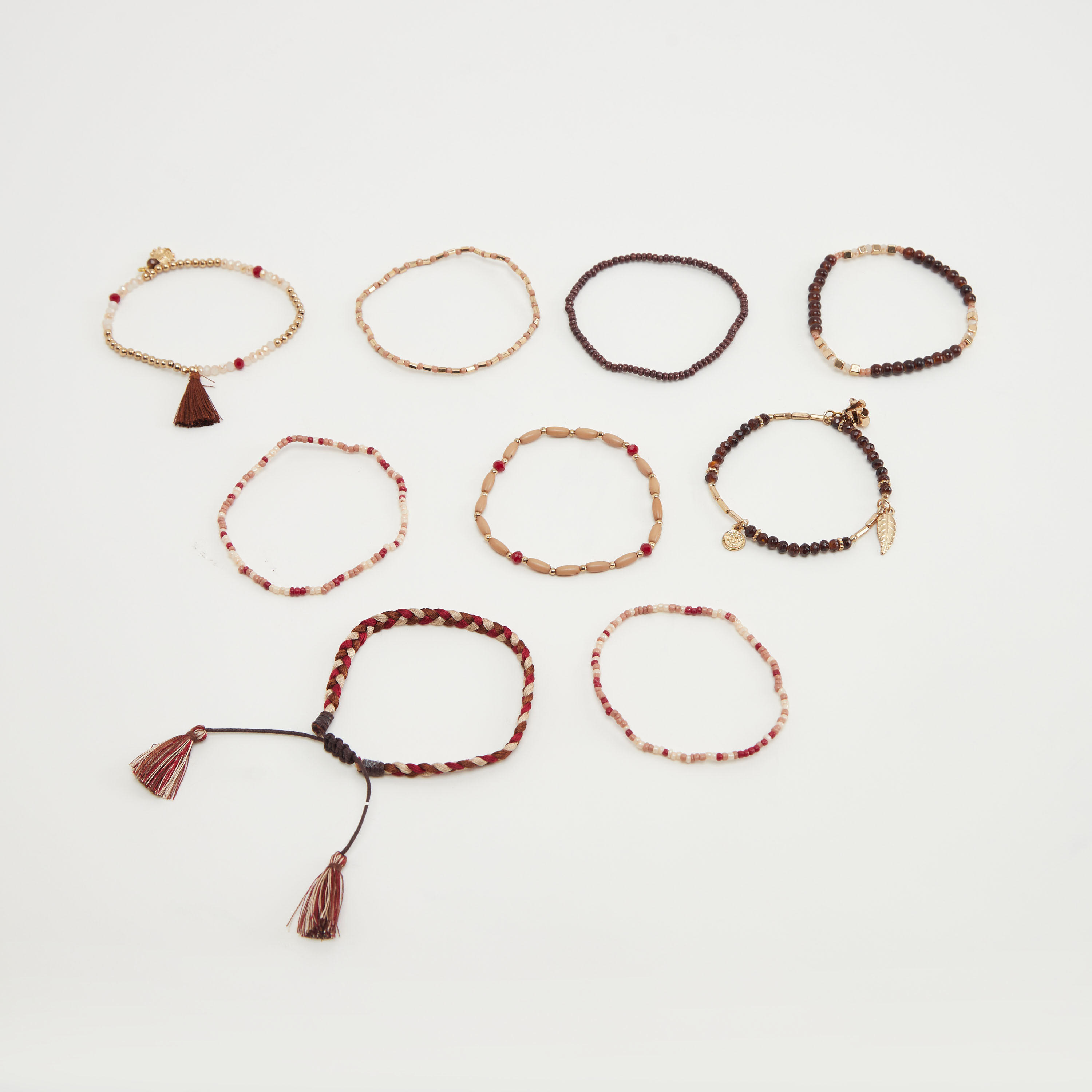أساور مزيّنة بالخرز - طقم من 9 قطع-women-watchesandjewellery-jewellery-banglesandbracelets-image-2