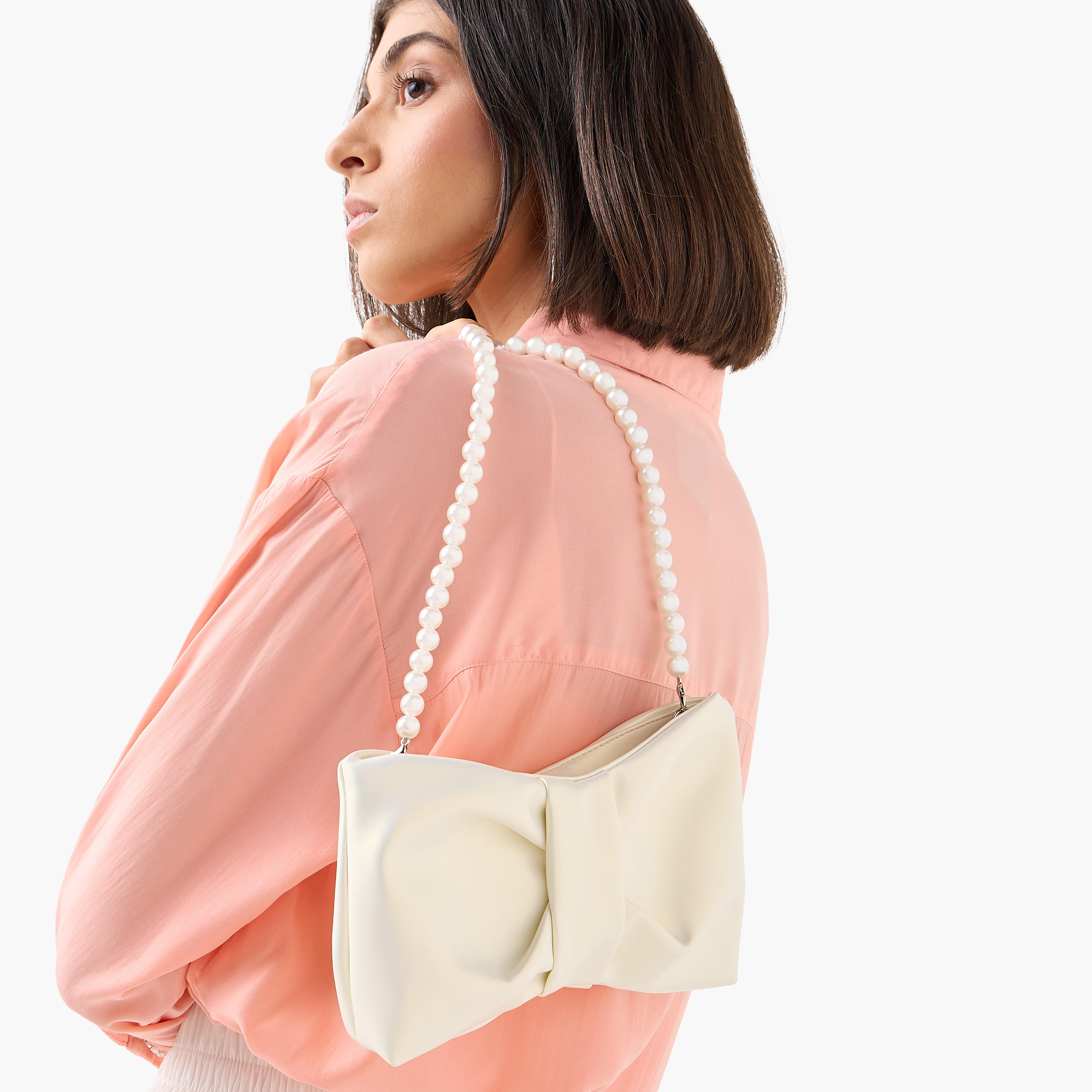 شنطة كروس بودي بشكل فيونكة بمقبض من اللؤلؤ-women-bagsandwallets-handbags-image-7