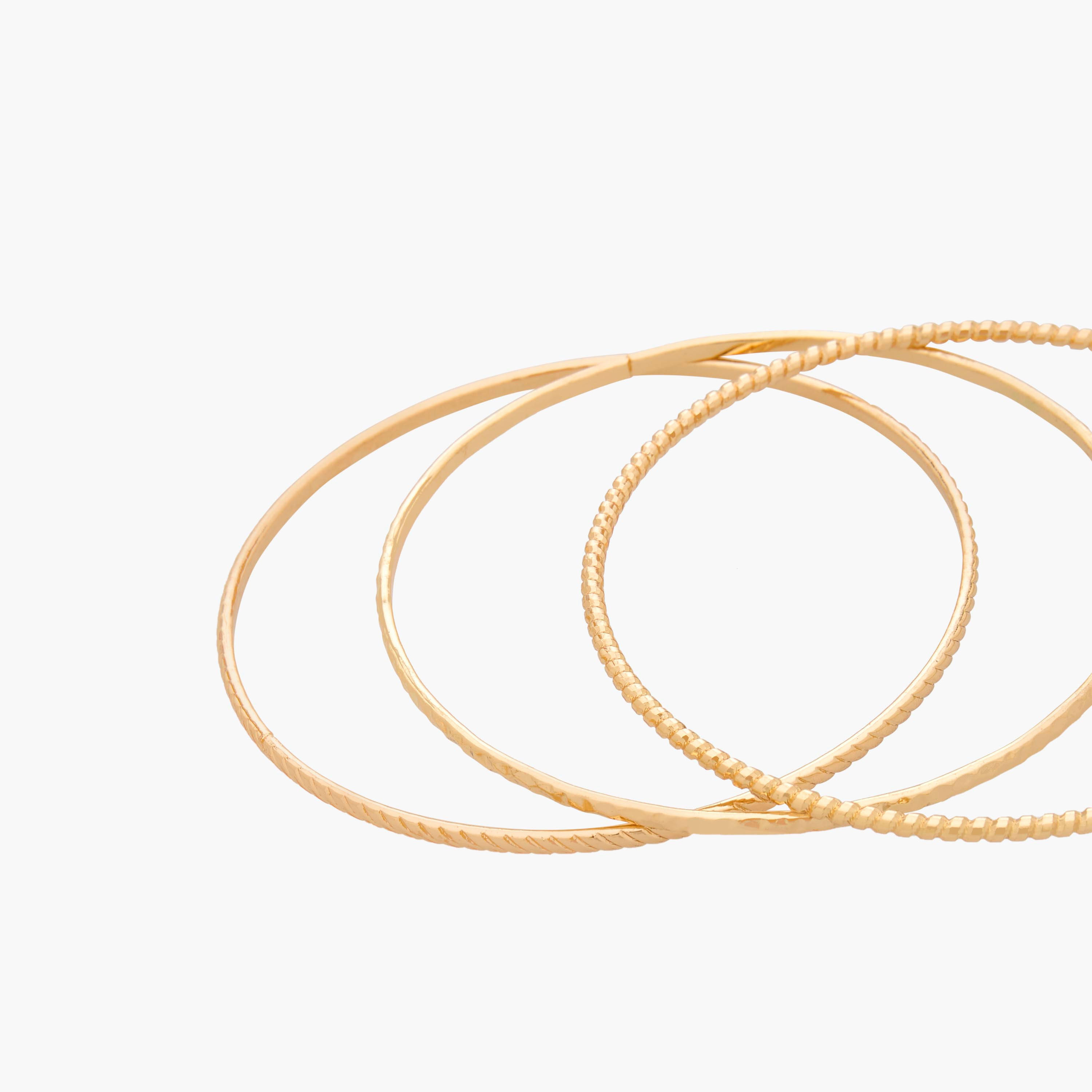 أساور بارزة الملمس بلون ذهبي - عبوة 7 قطع-women-watchesandjewellery-jewellery-banglesandbracelets-image-17