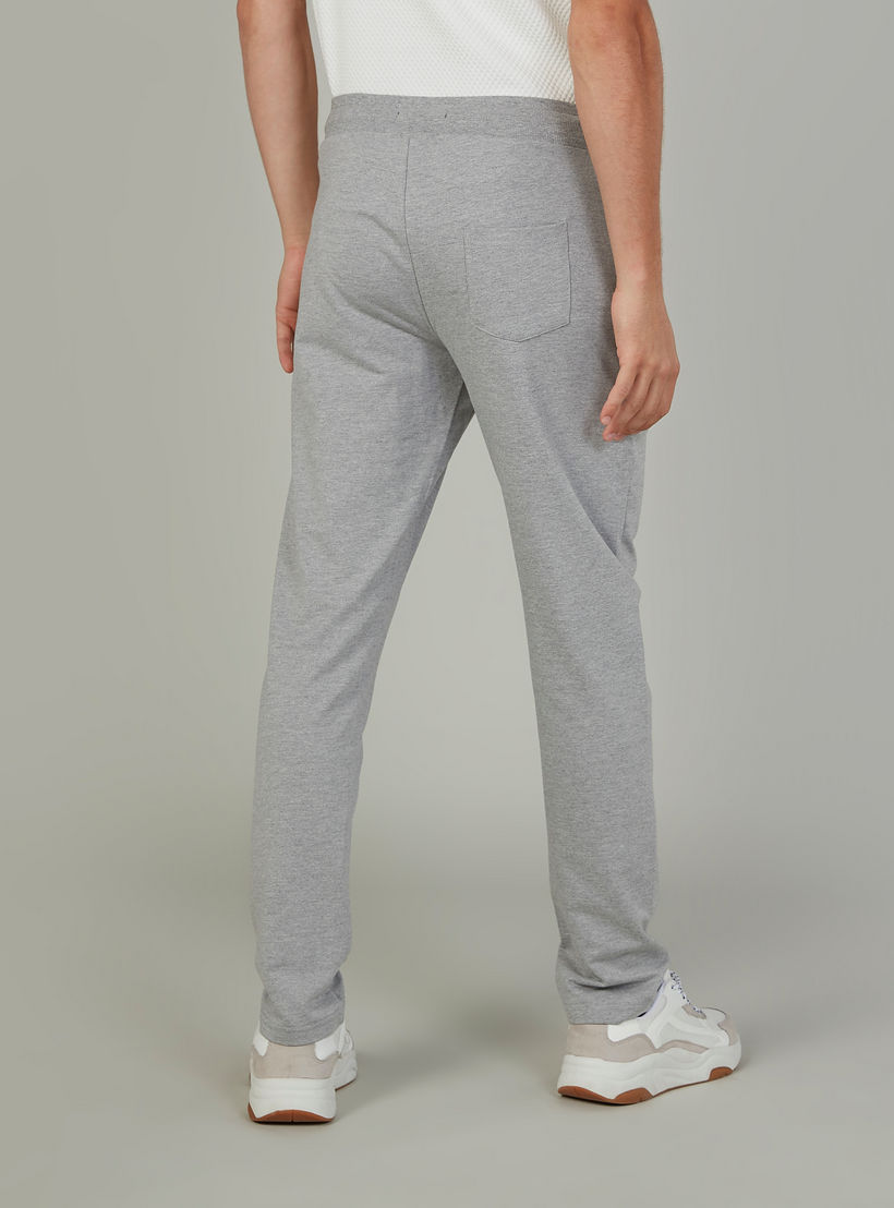 بنطلون بخصر مطاطي وجيوب بطبعات-men-clothing-bottoms-trousersandchinos-trousers-image-4