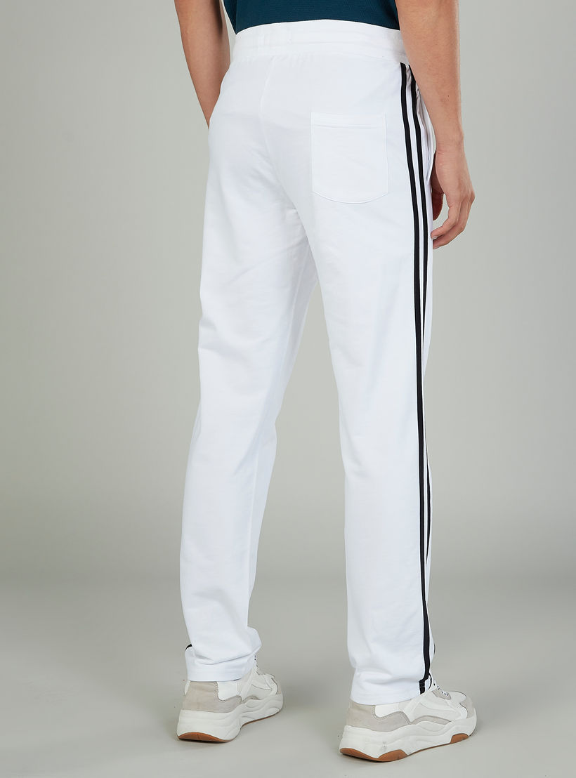 بنطلون سادة بخصر مطّاطي بتفاصيل شريطة مخططة-men-clothing-nightwear-pyjamaandshorts-image-3