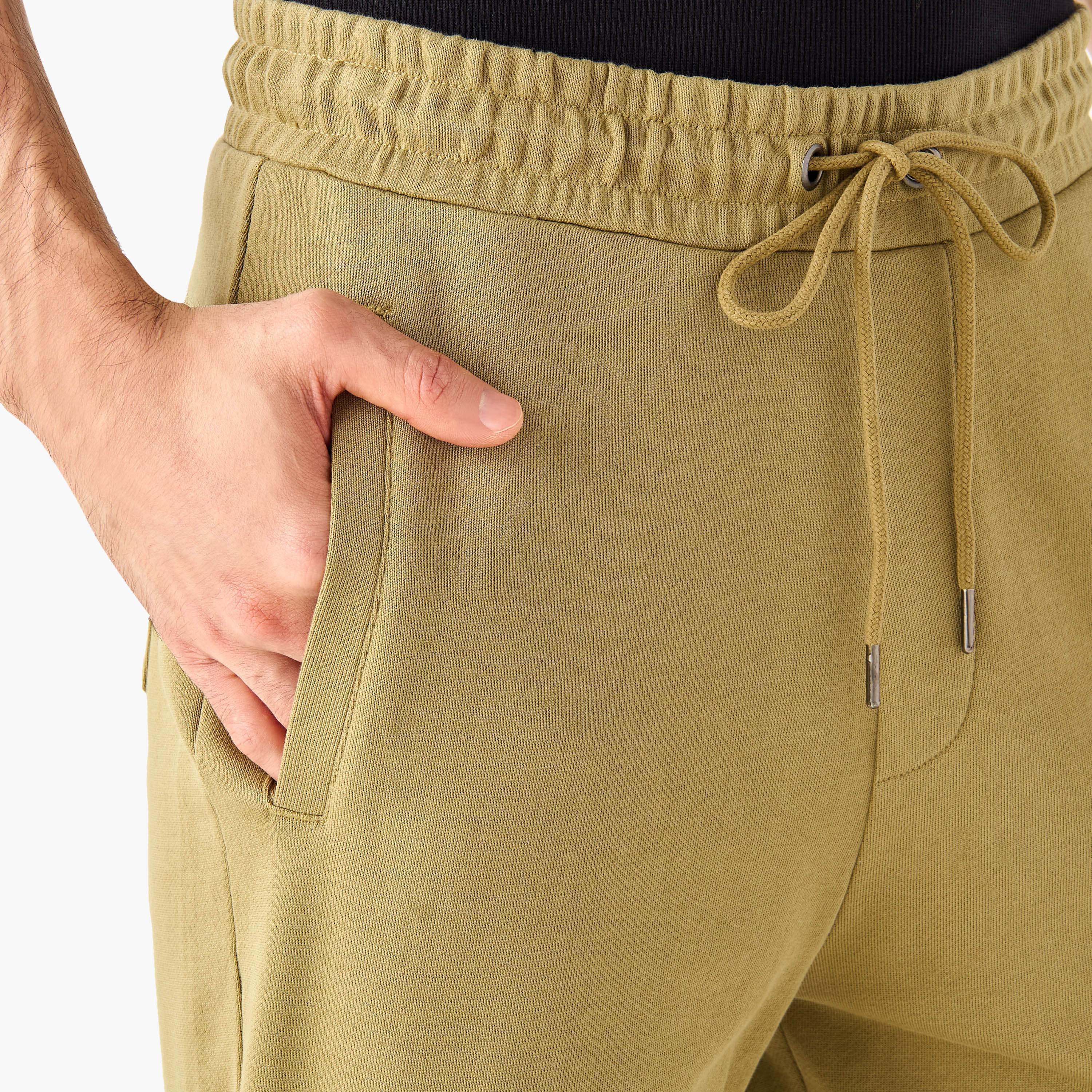 بنطلون بيجاما بحزام خصر مطاطي وجيوب-men-clothing-nightwear-pyjamaandshorts-image-4