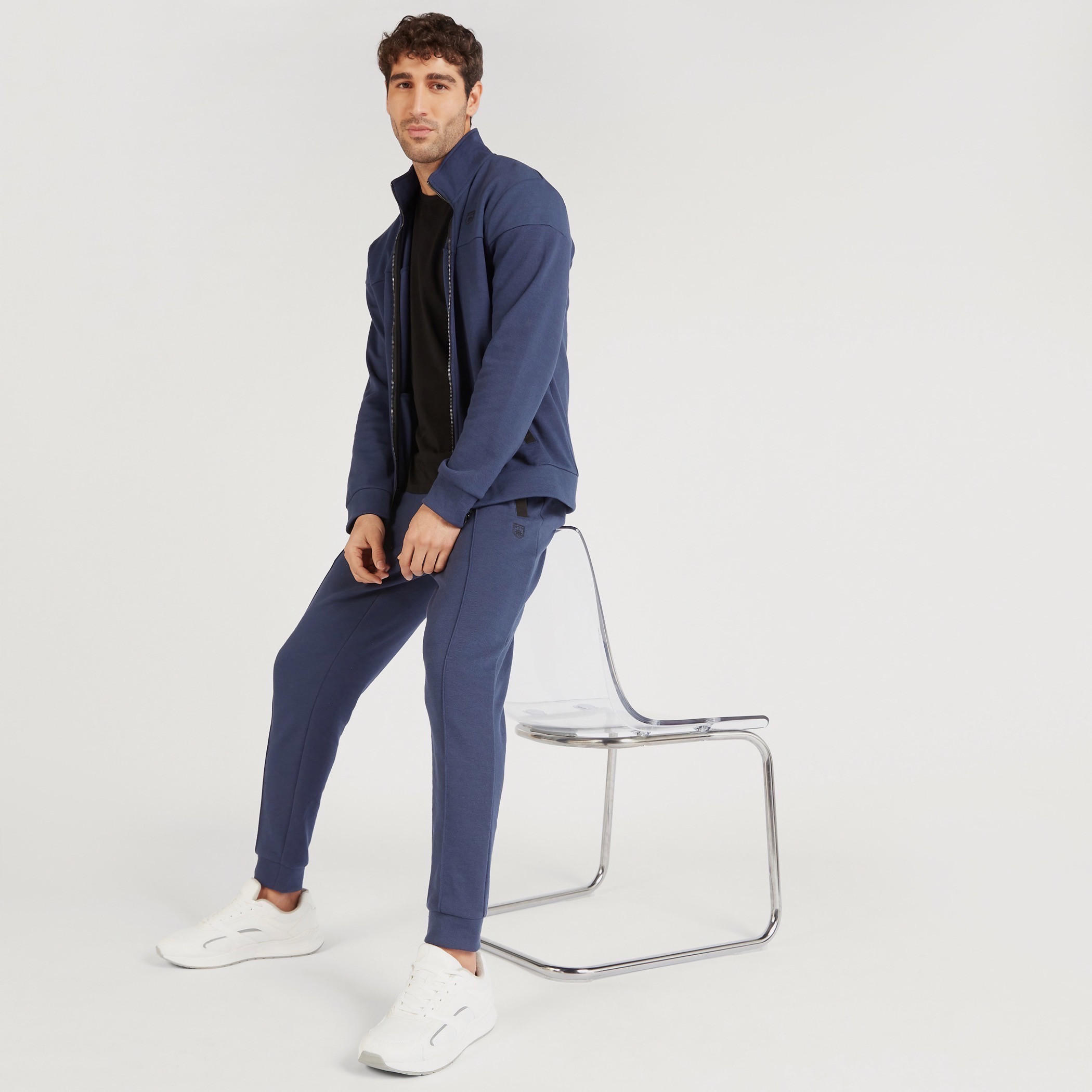 بنطلون رياضي بارز الملمس بخصر مطّاطي متوسّط الارتفاع وجيوب-men-clothing-bottoms-joggers-image-2