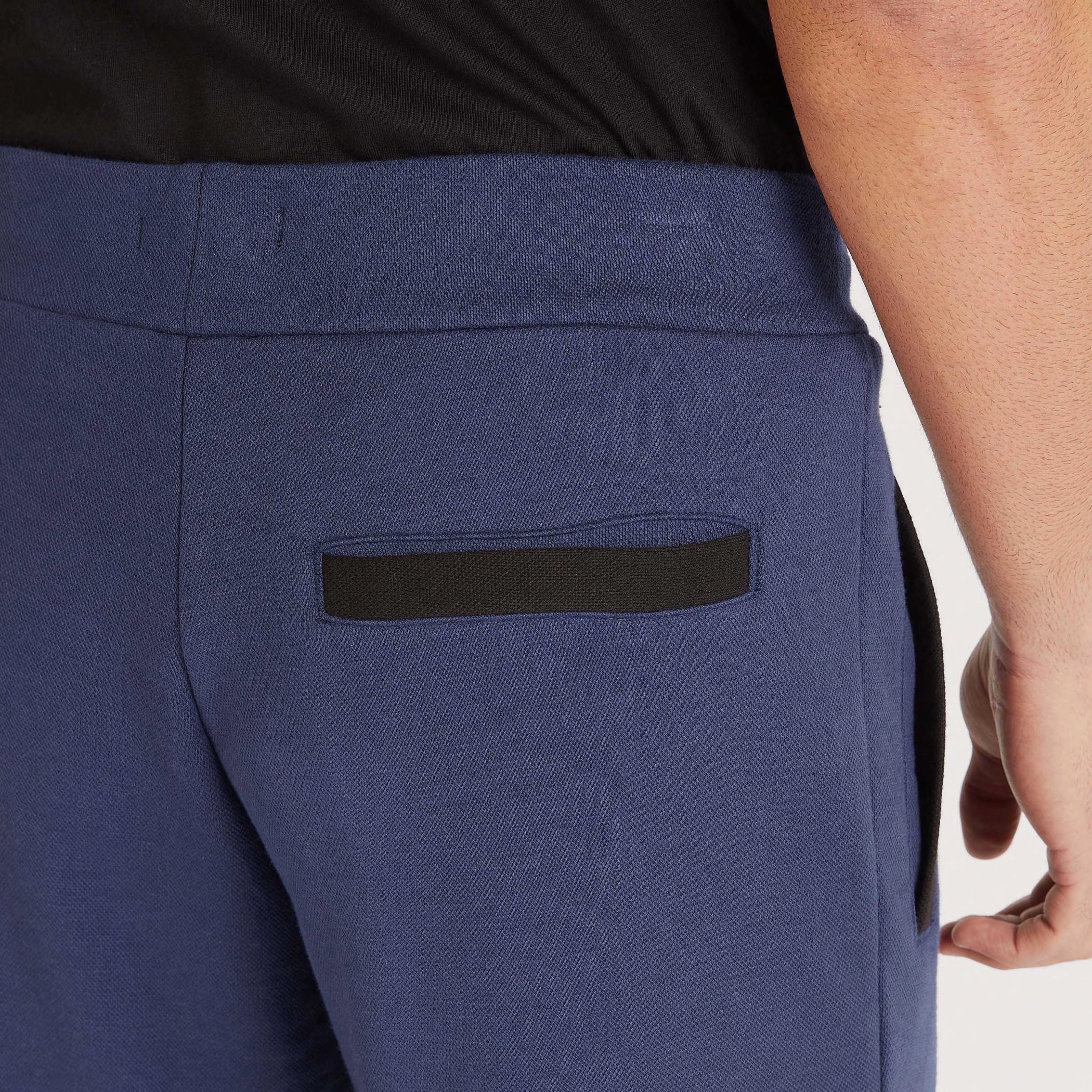 بنطلون رياضي بارز الملمس بخصر مطّاطي متوسّط الارتفاع وجيوب-men-clothing-bottoms-joggers-image-5