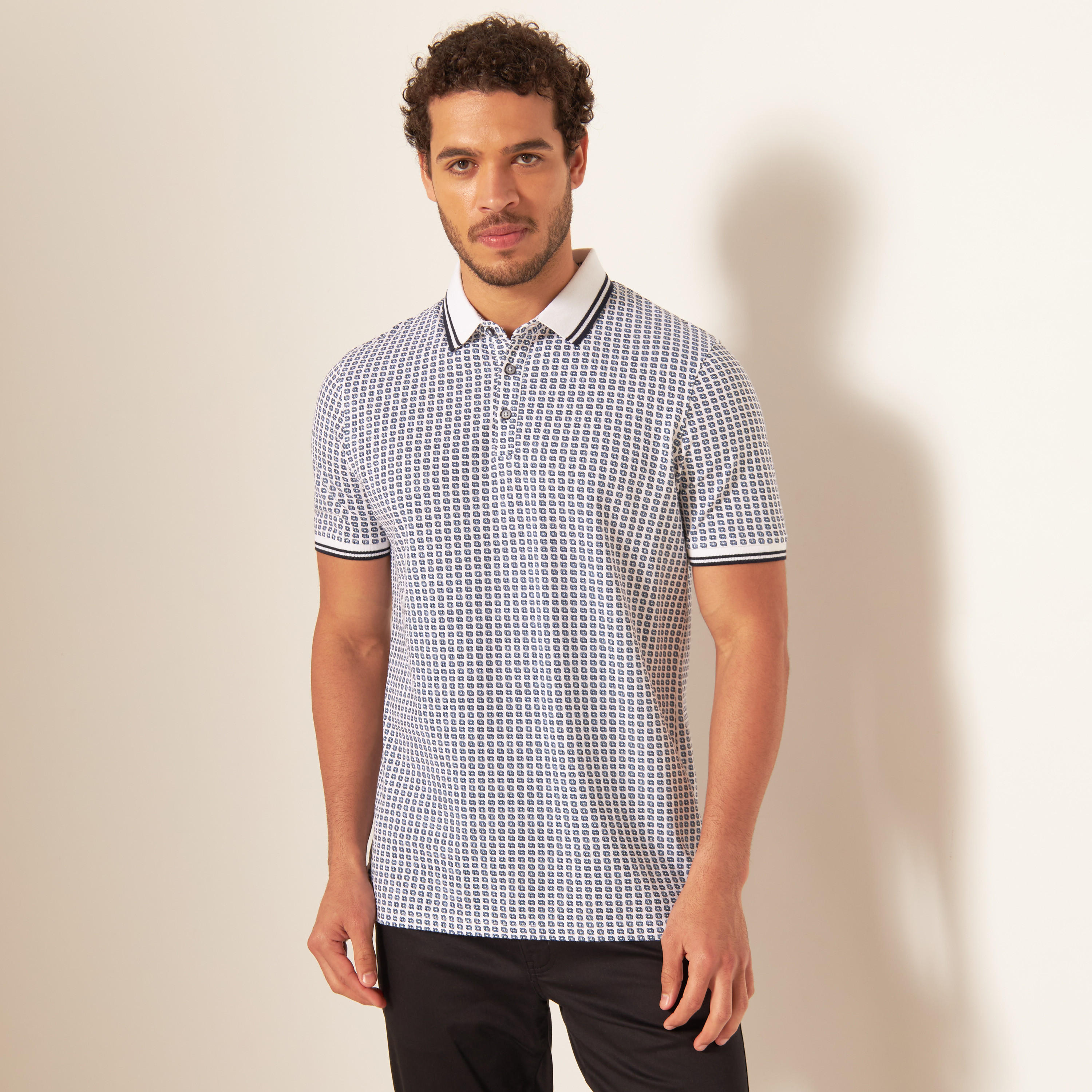 تيشيرت بولو بأكمام قصيرة وأزرار إغلاق وطبعات-men-clothing-tshirtsandpolos-polos-image-1