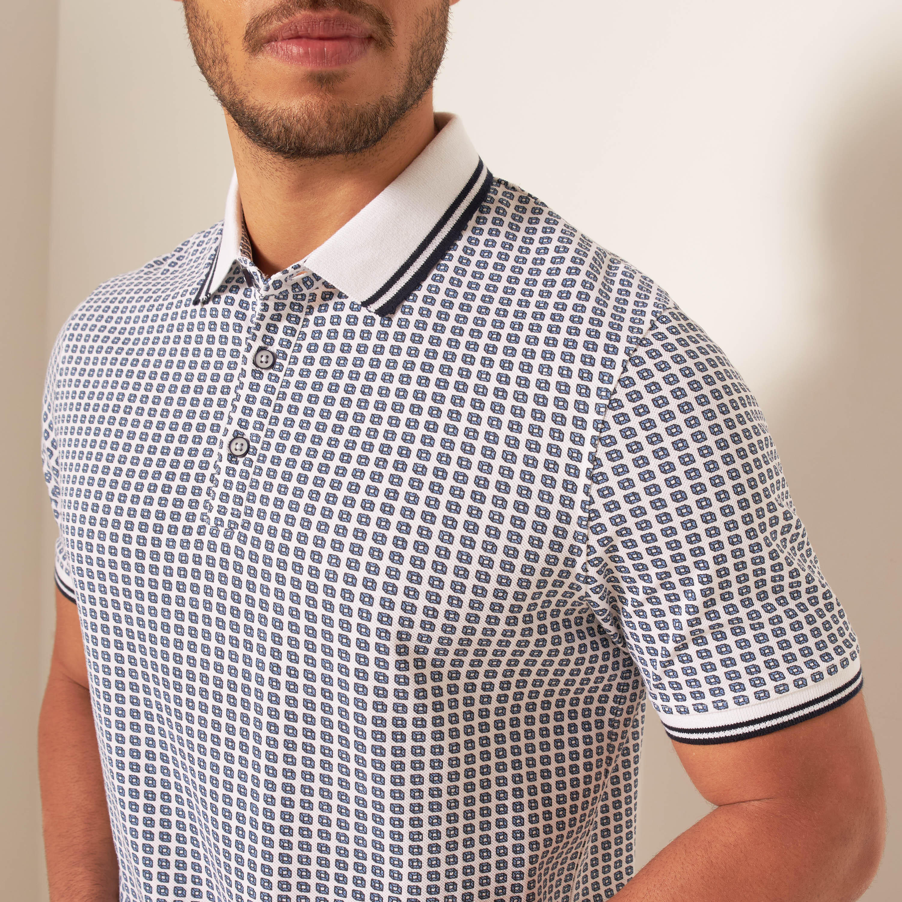 تيشيرت بولو بأكمام قصيرة وأزرار إغلاق وطبعات-men-clothing-tshirtsandpolos-polos-image-4