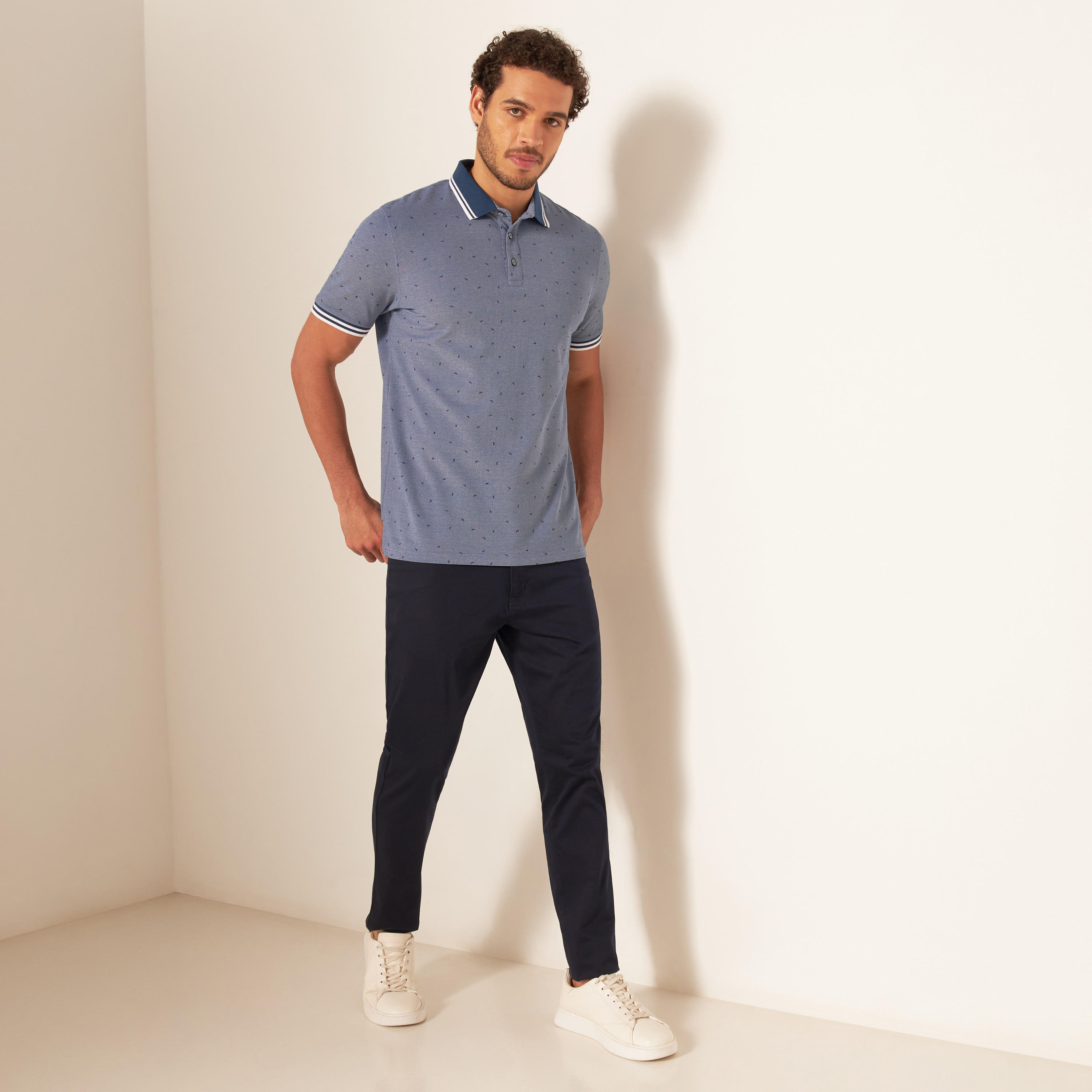 تيشيرت بولو بأكمام قصيرة وأزرار إغلاق وطبعات-men-clothing-tshirtsandpolos-polos-image-2