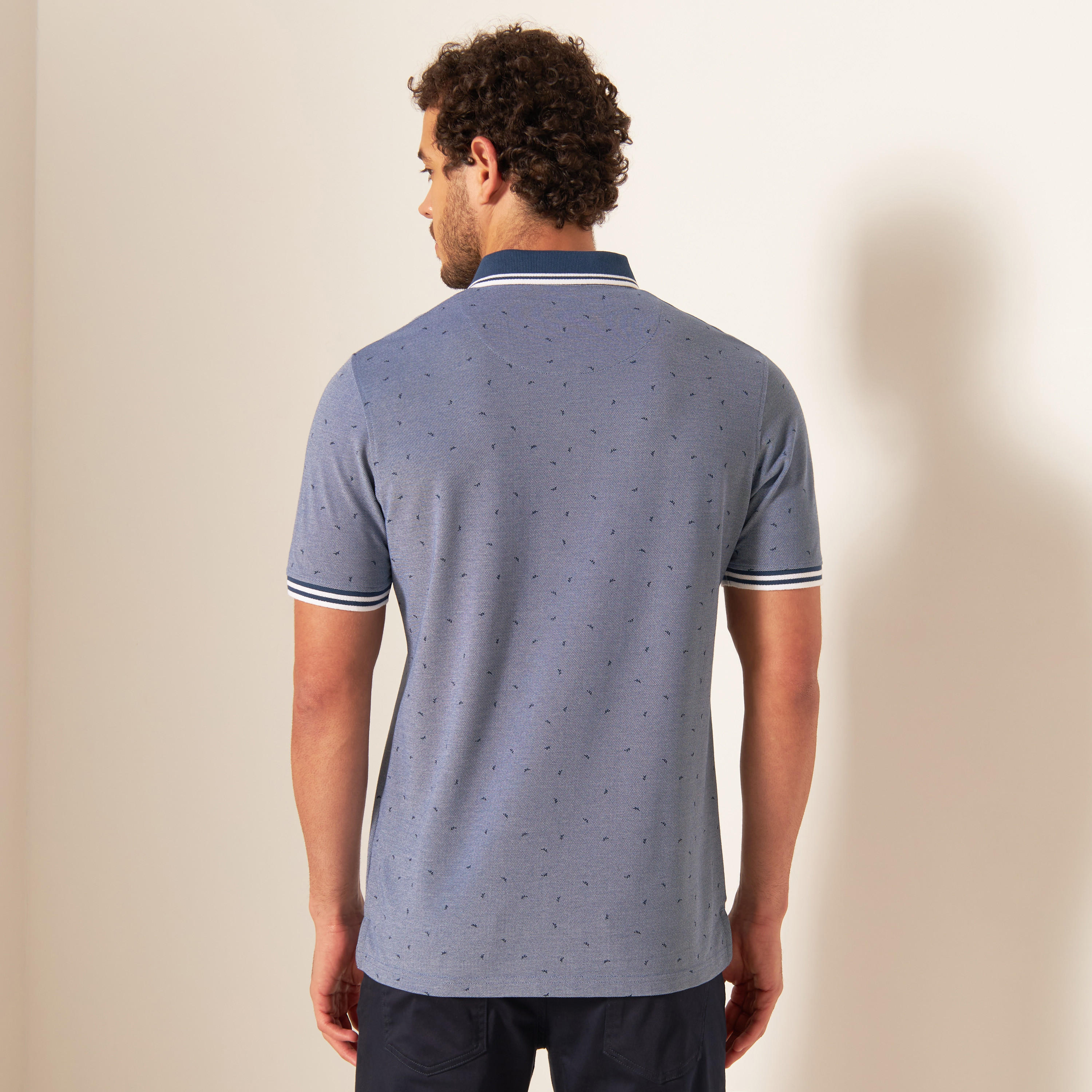 تيشيرت بولو بأكمام قصيرة وأزرار إغلاق وطبعات-men-clothing-tshirtsandpolos-polos-image-3