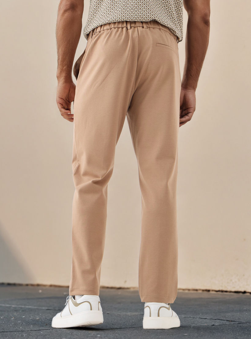 بنطلون بقصة عادية وخصر مرن وجيوب-men-clothing-bottoms-trousersandchinos-trousers-image-3