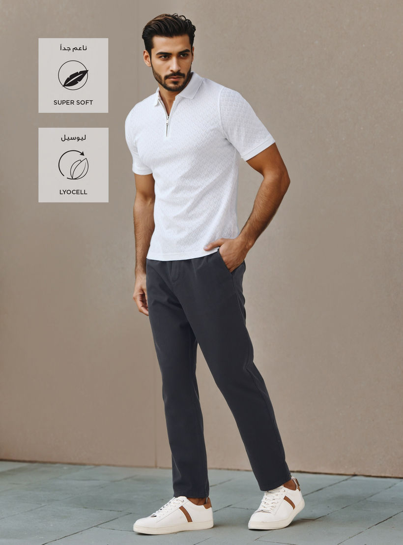 بنطلون بقصّة عادية وخصر مطاطي-men-clothing-bottoms-trousersandchinos-trousers-image-2