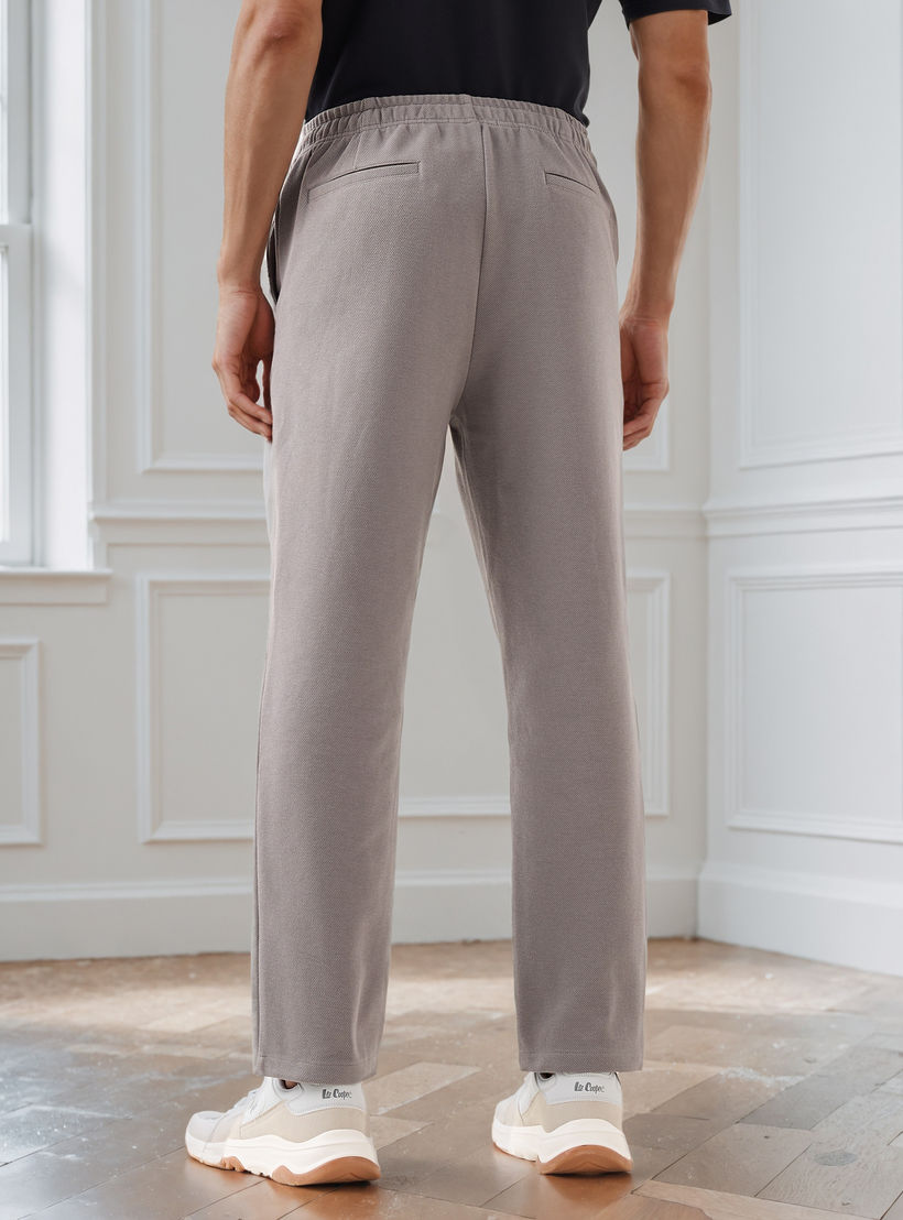 بنطلون رجالي بخصر مرن وقصة عادية وجيوب-men-clothing-bottoms-joggers-image-3